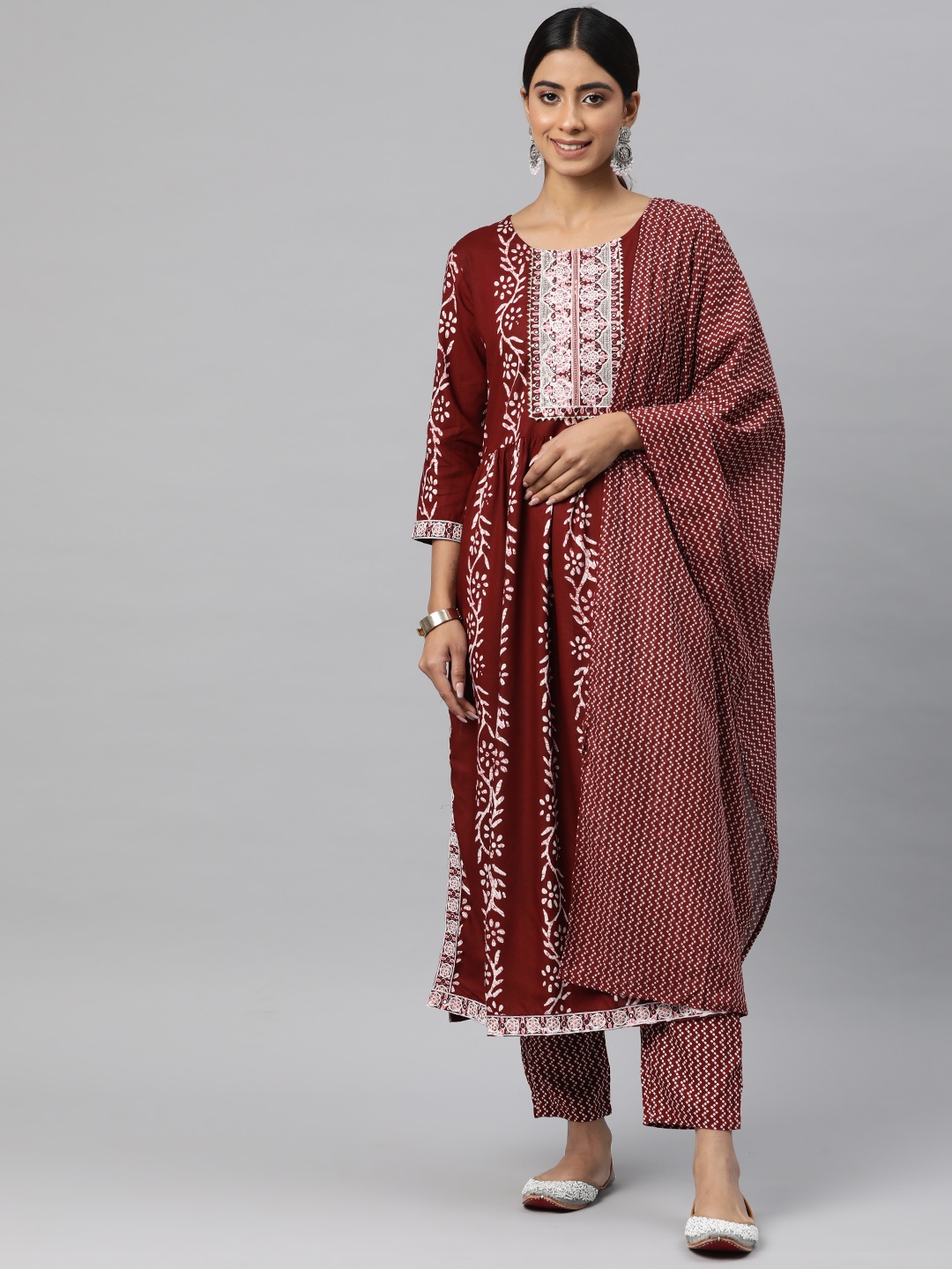 

Readiprint Women Printed Empire Mirror Work Kurta with Trousers & With Dupatta, Maroon