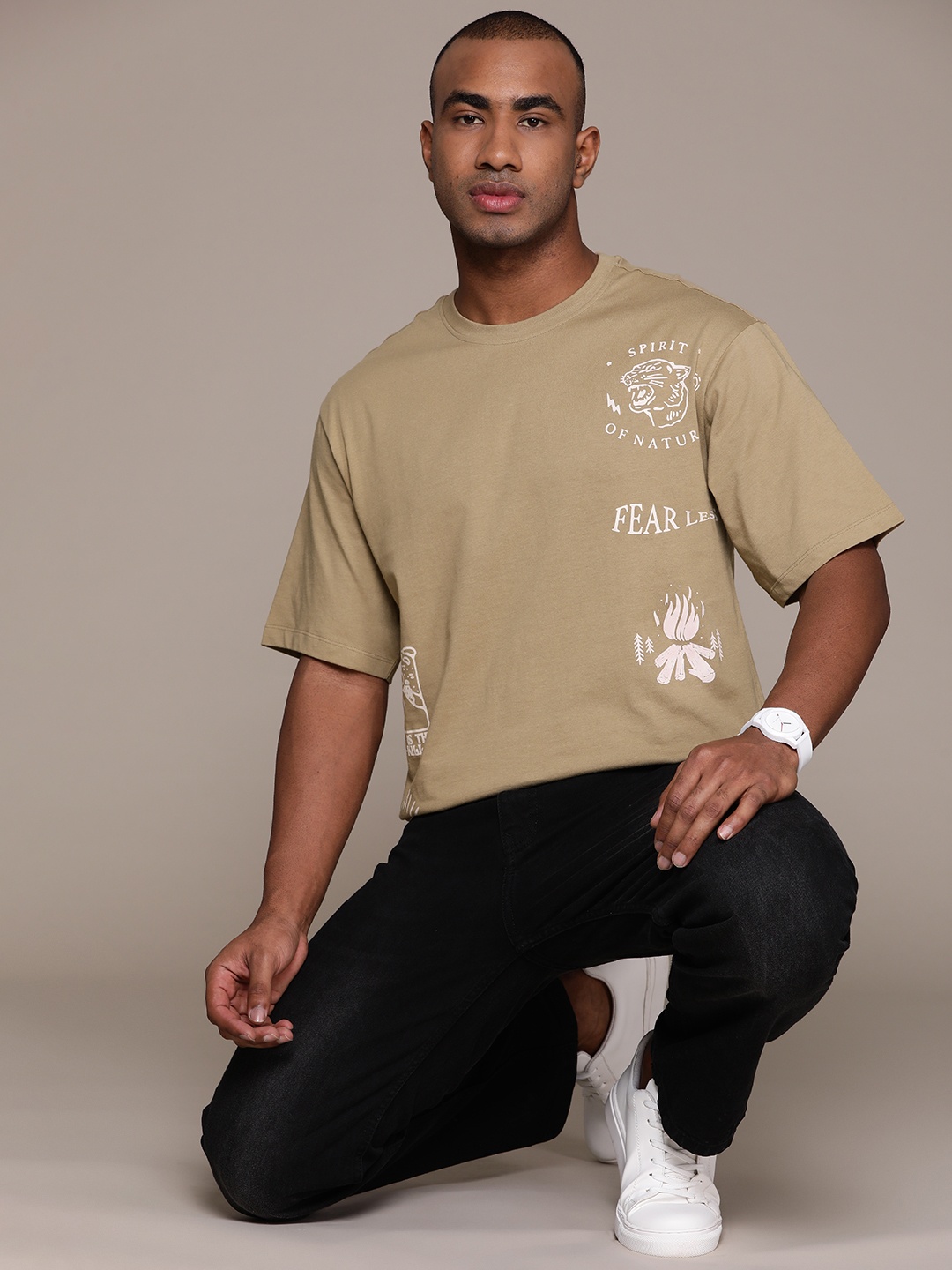

The Roadster Lifestyle Co. Men Printed Relaxed Fit Pure Cotton T-shirt, Khaki