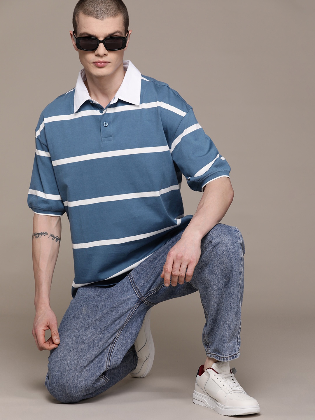 

Roadster Men Striped Polo Collar Drop-Shoulder Sleeves Cotton T-shirt, Blue