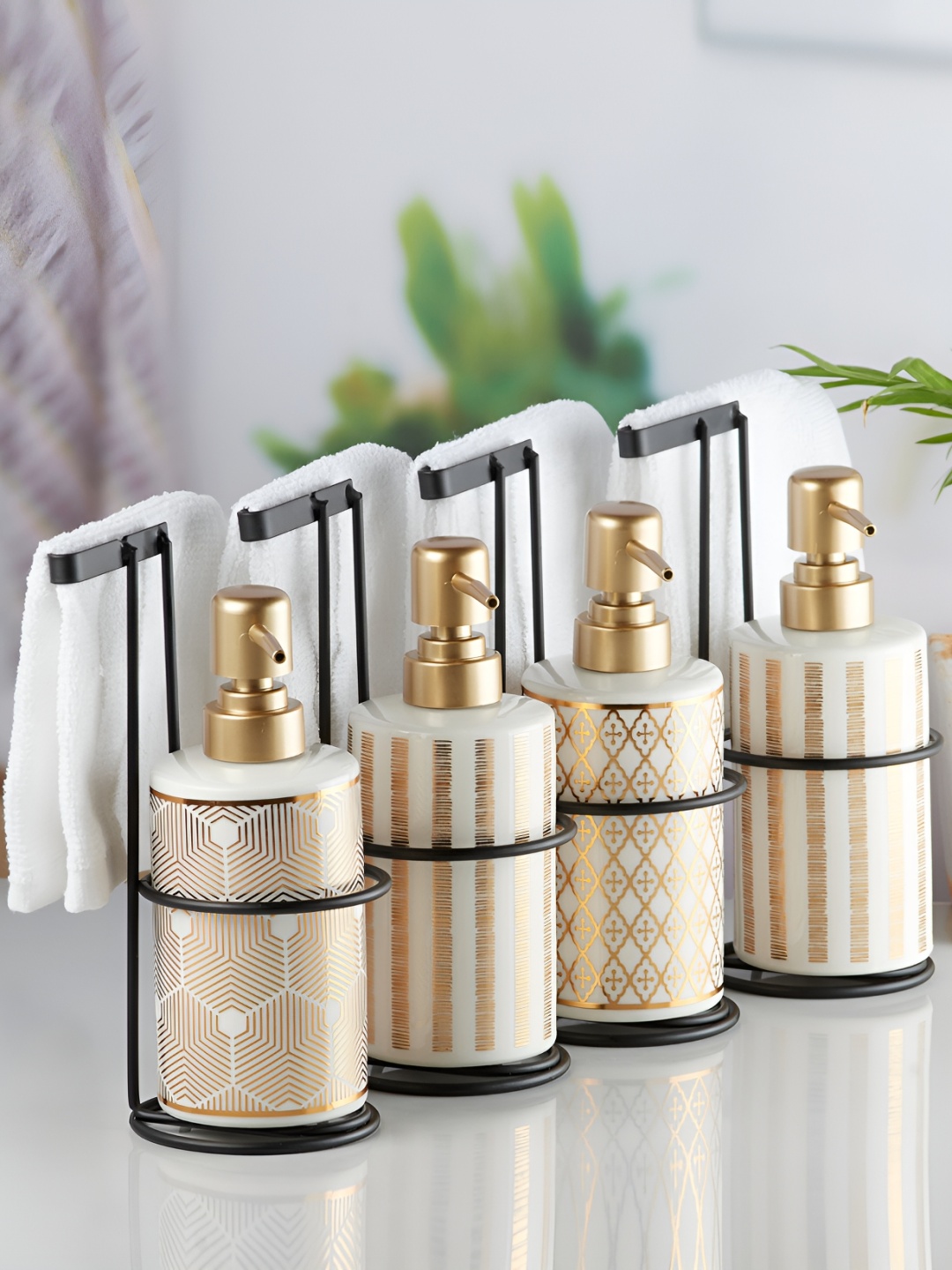 

Kookee White & Gold Toned 4 Piece Ceramic Geometric Printed Soap Dispenser
