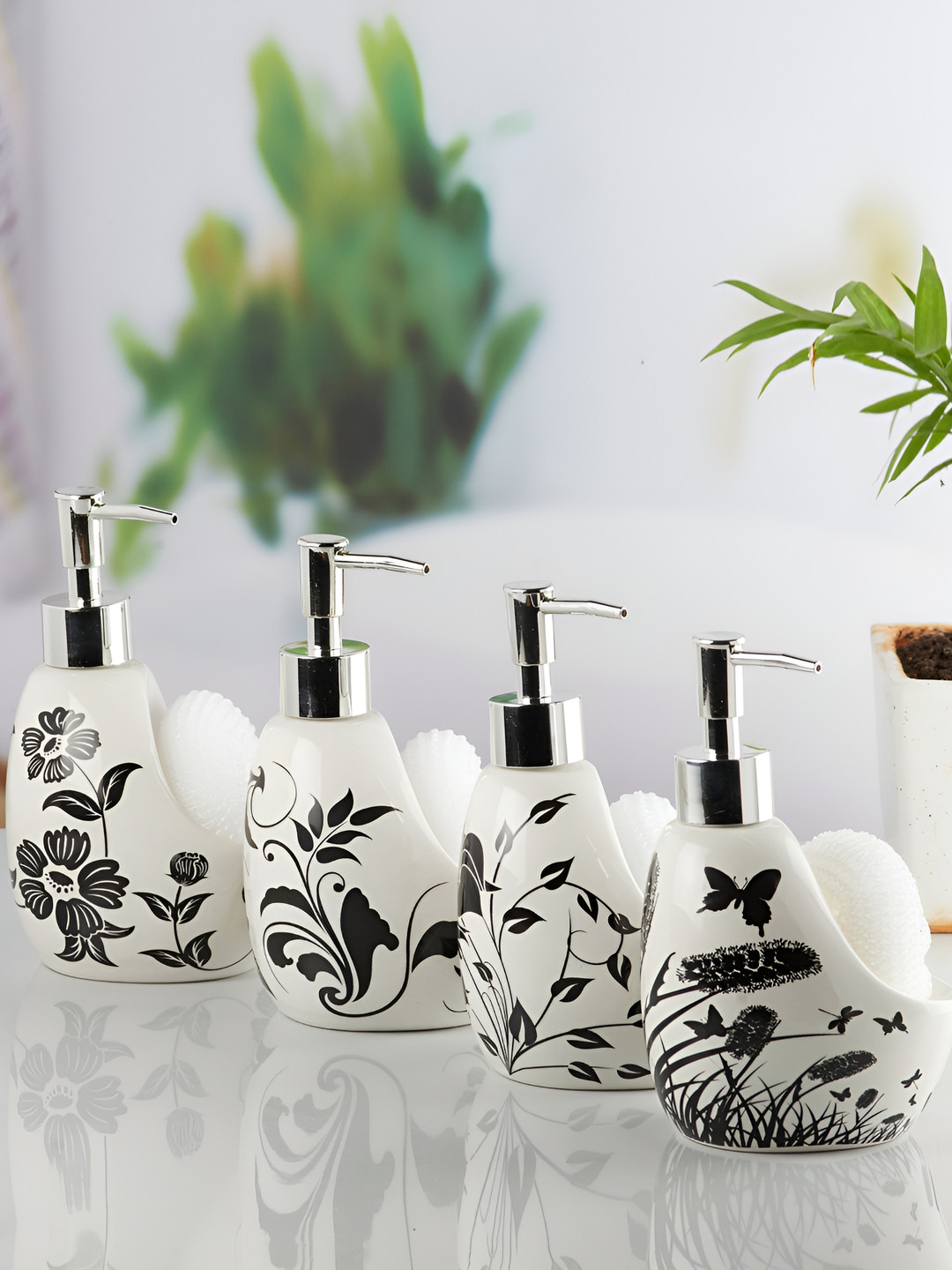 

Kookee White 4 piece Abstract Ceramic Soap Dispenser