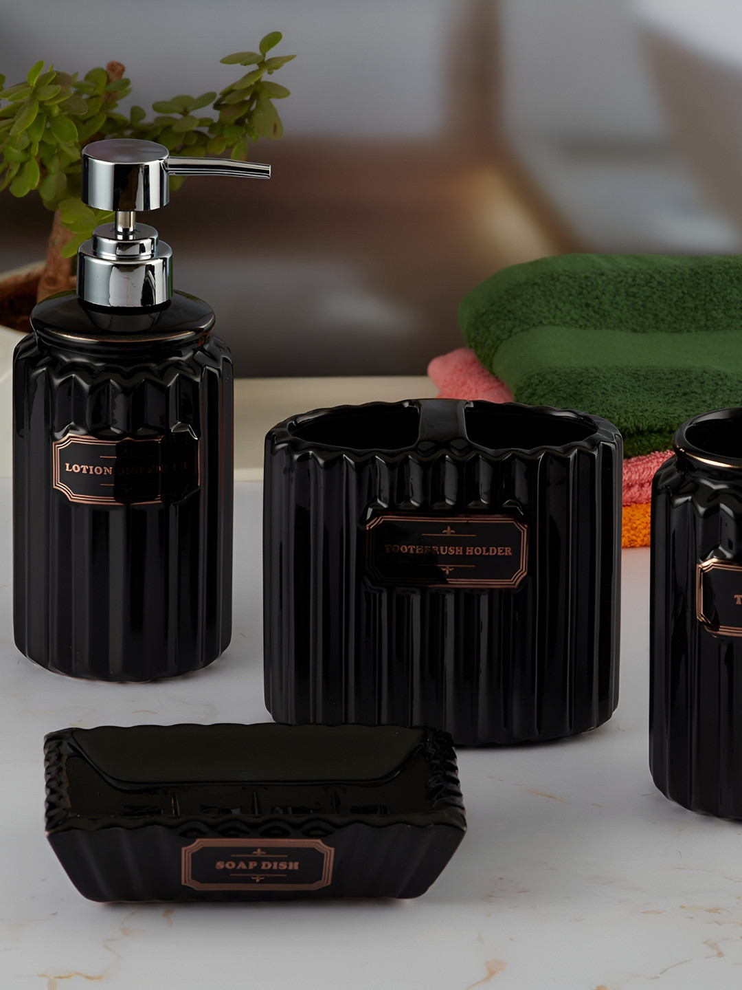 

Kookee Black 4 piece Textured Ceramic Bath Accessories Set