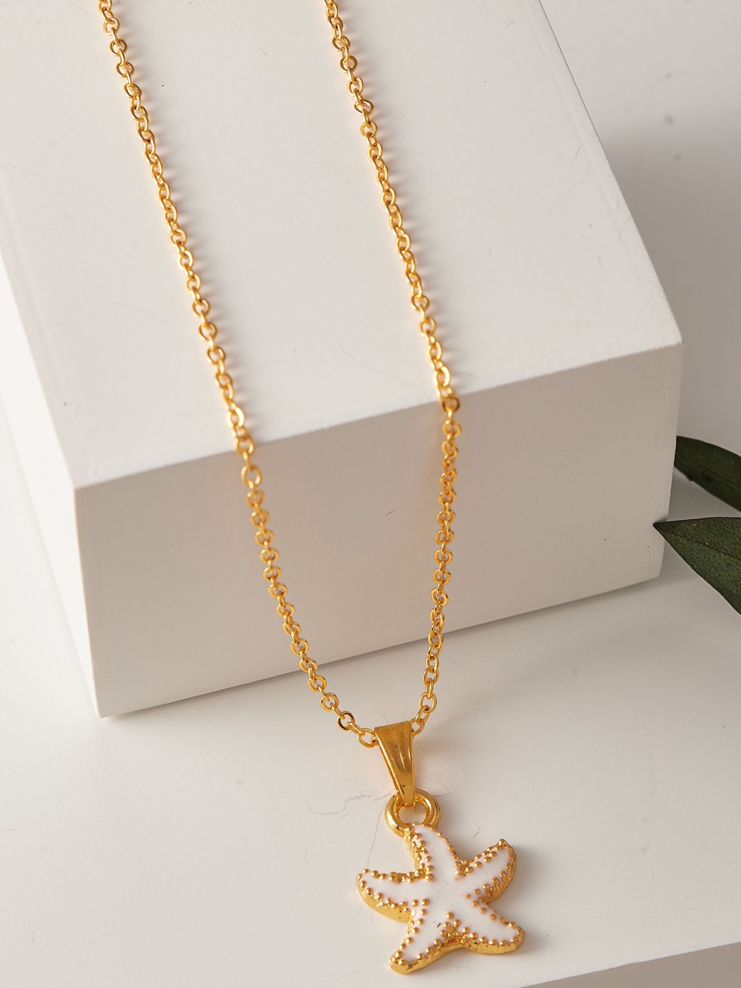 

DressBerry Gold-Plated Stone Studded Pendant With Chain