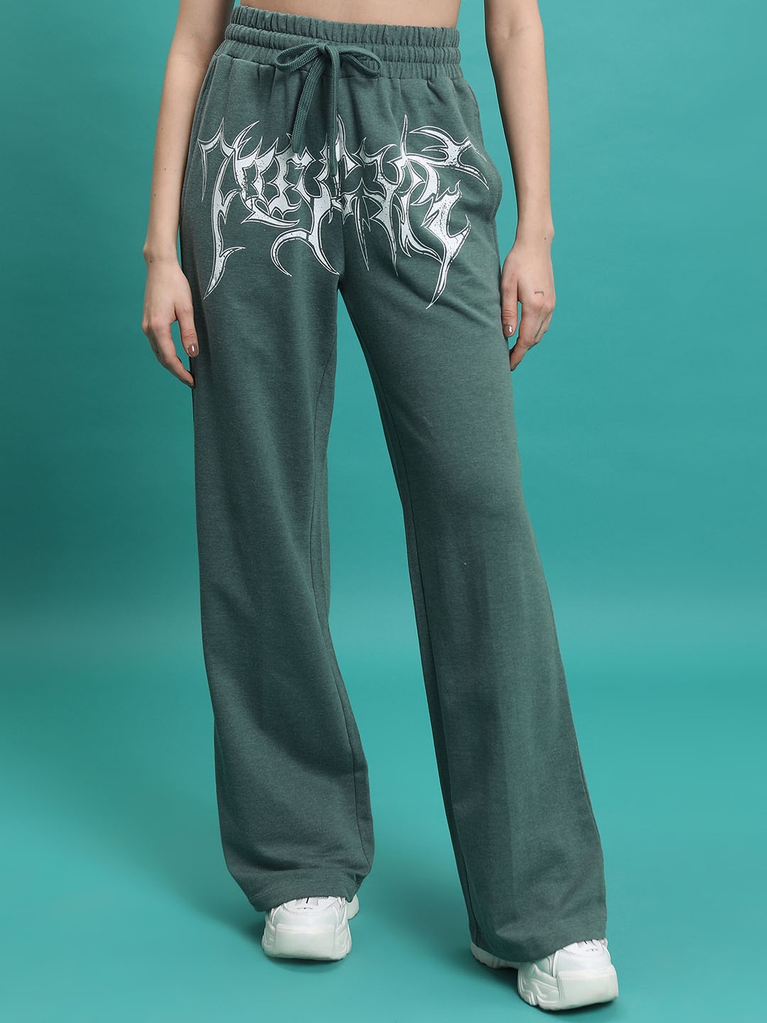 

Tokyo Talkies Women Green Abstract Printed Flared Parallel Trousers