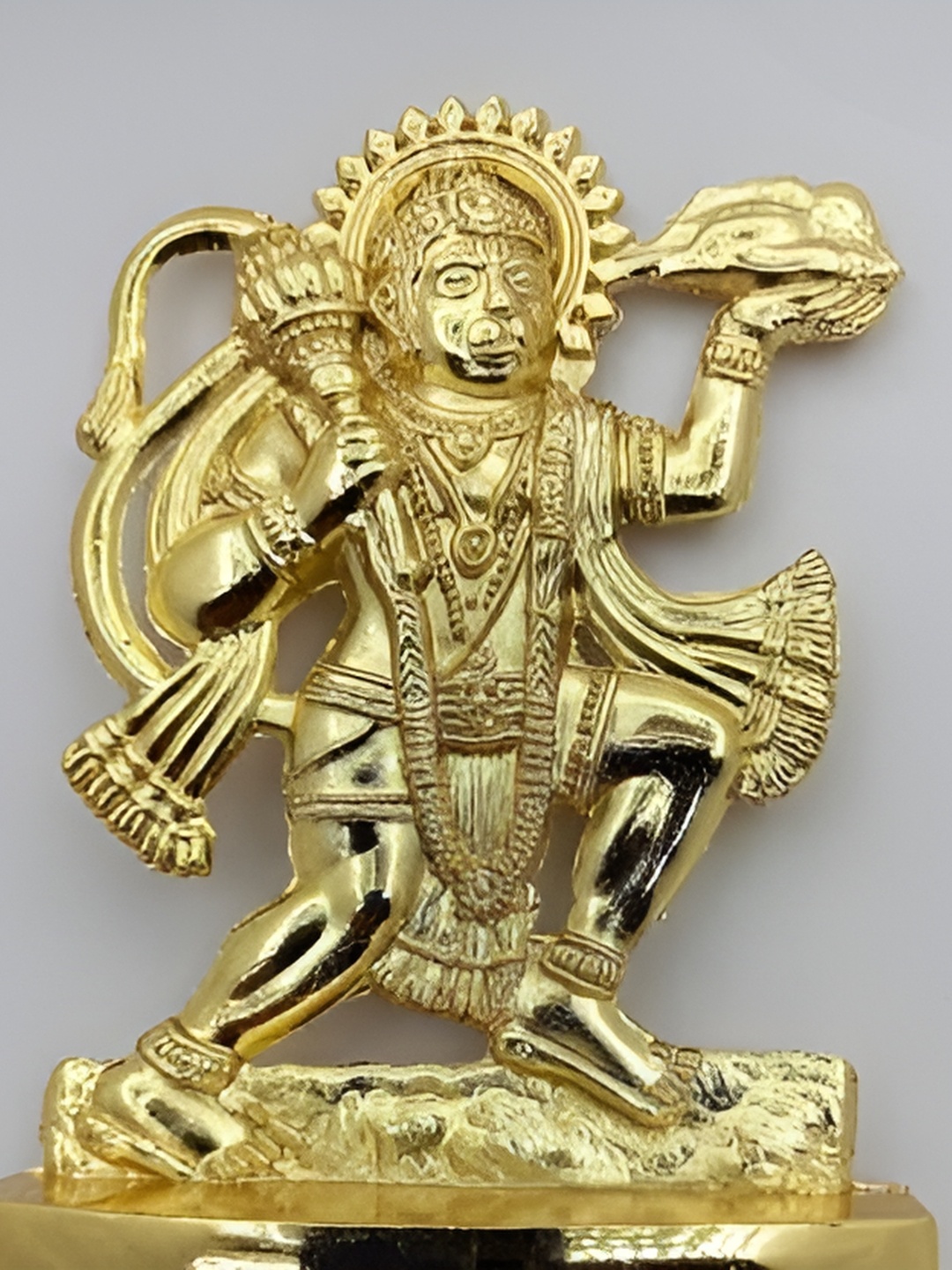 

Navyaksh Gold Toned Textured Religious Hanuman Showpiece