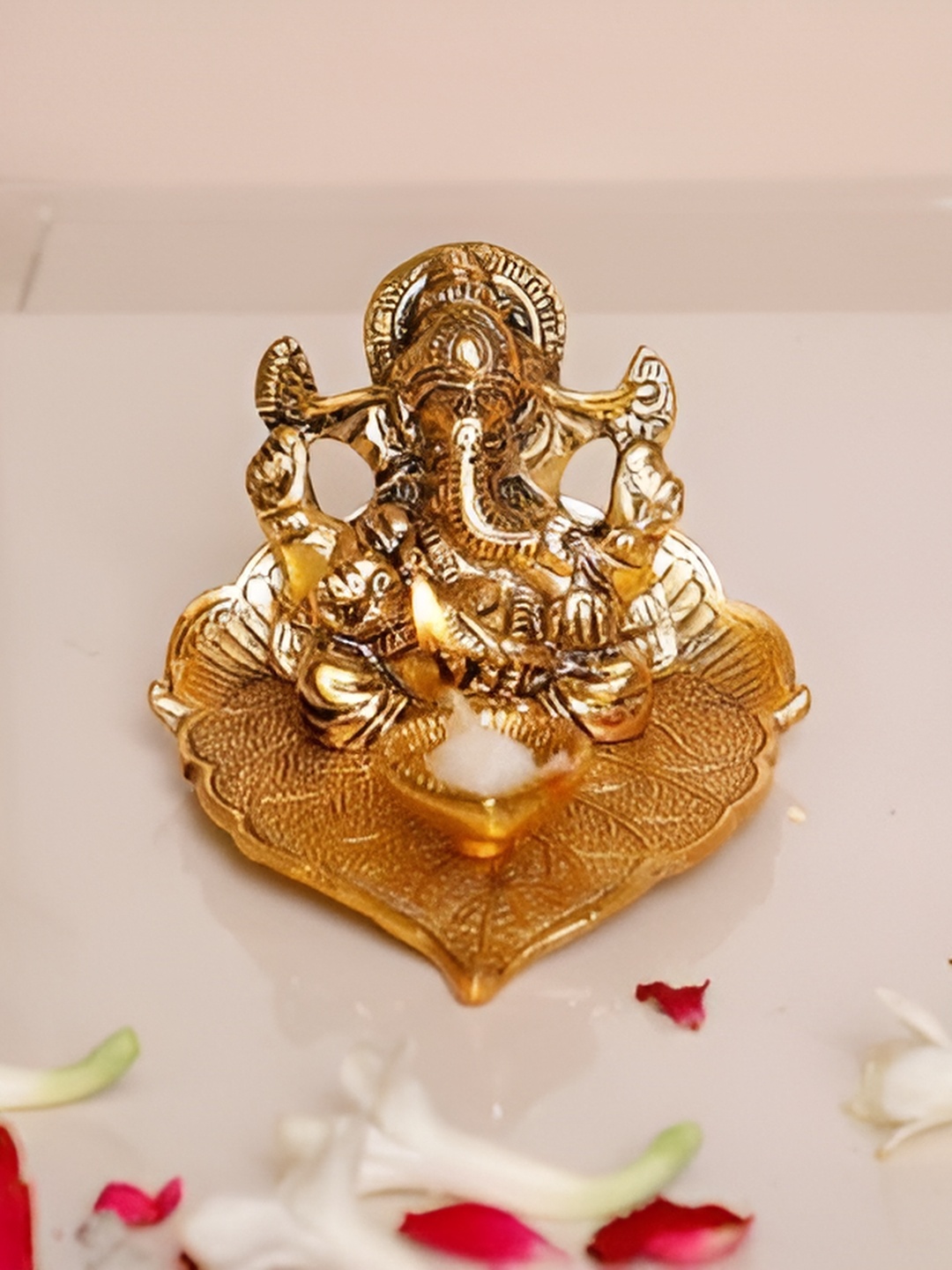 

Navyaksh Gold Toned Metal Showpiece, Multi