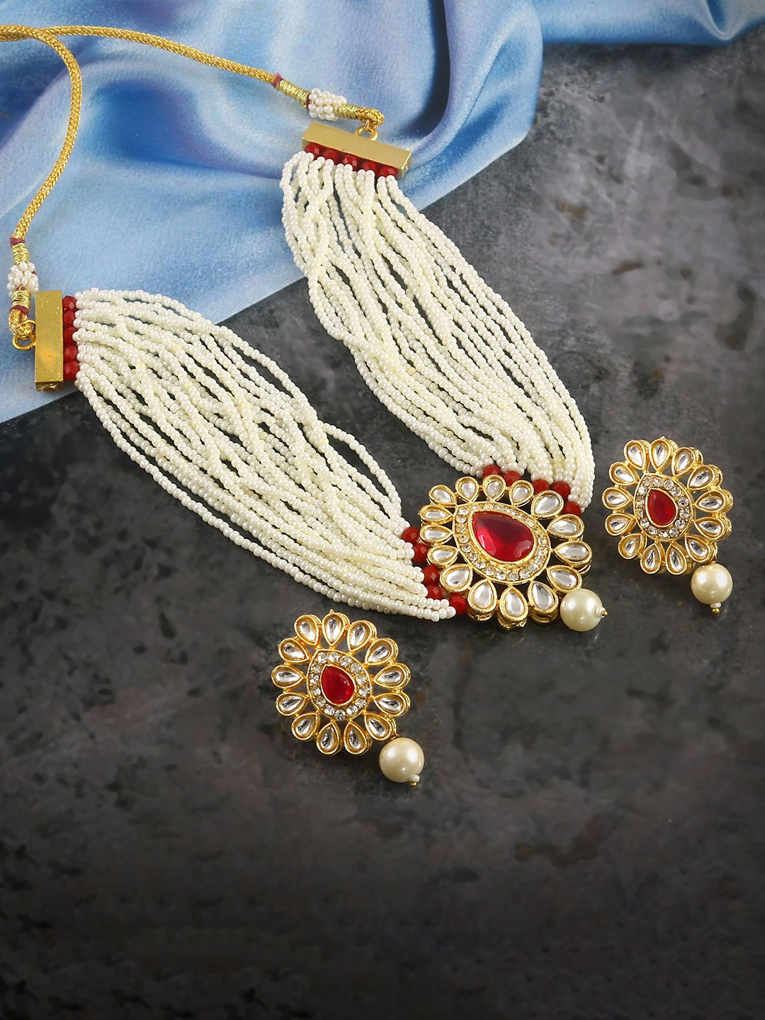 

Jewar Mandi Gold Plated Kundan Studded & Beaded Layered Jewellery Set