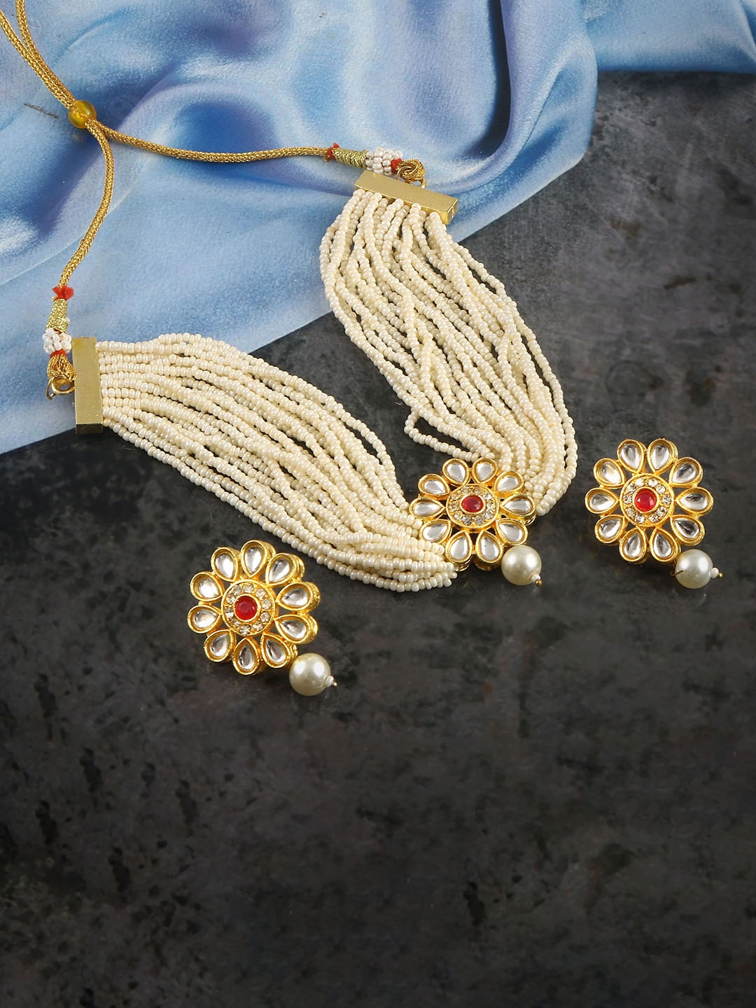 

Jewar Mandi Gold Plated Kundan Studded & Beaded Layered Jewellery Set