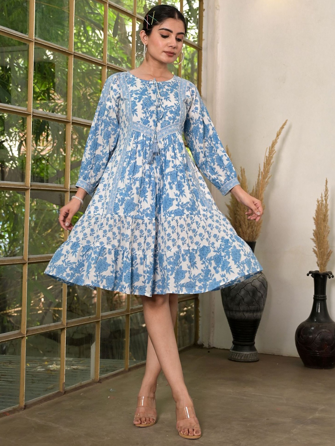 

The Kapas Floral Printed Tie-Up Neck Puff Sleeve Sequined Detail Cotton A-Line Dress, Blue