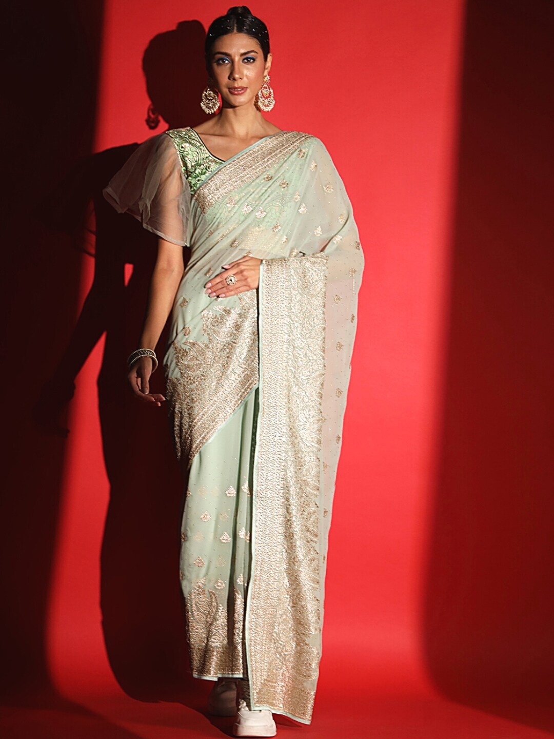 

Chhabra 555 Ethnic Motifs Embroidered Sequinned Saree, Green