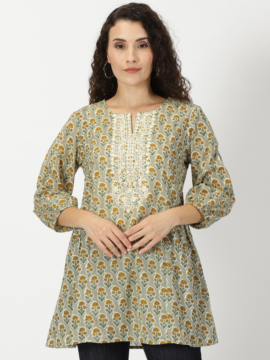 

Saffron Threads Pure Cotton Floral Print A-line Kurti Tunic with Embroidered Yoke, Green