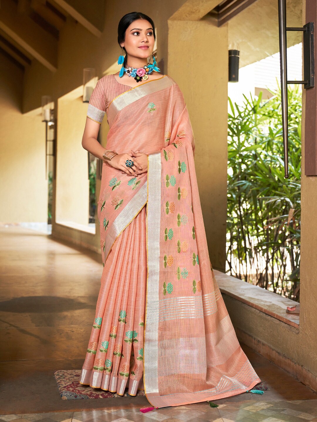 

Mitera Peach Embellished Linen Blend Embroidered Designer Saree