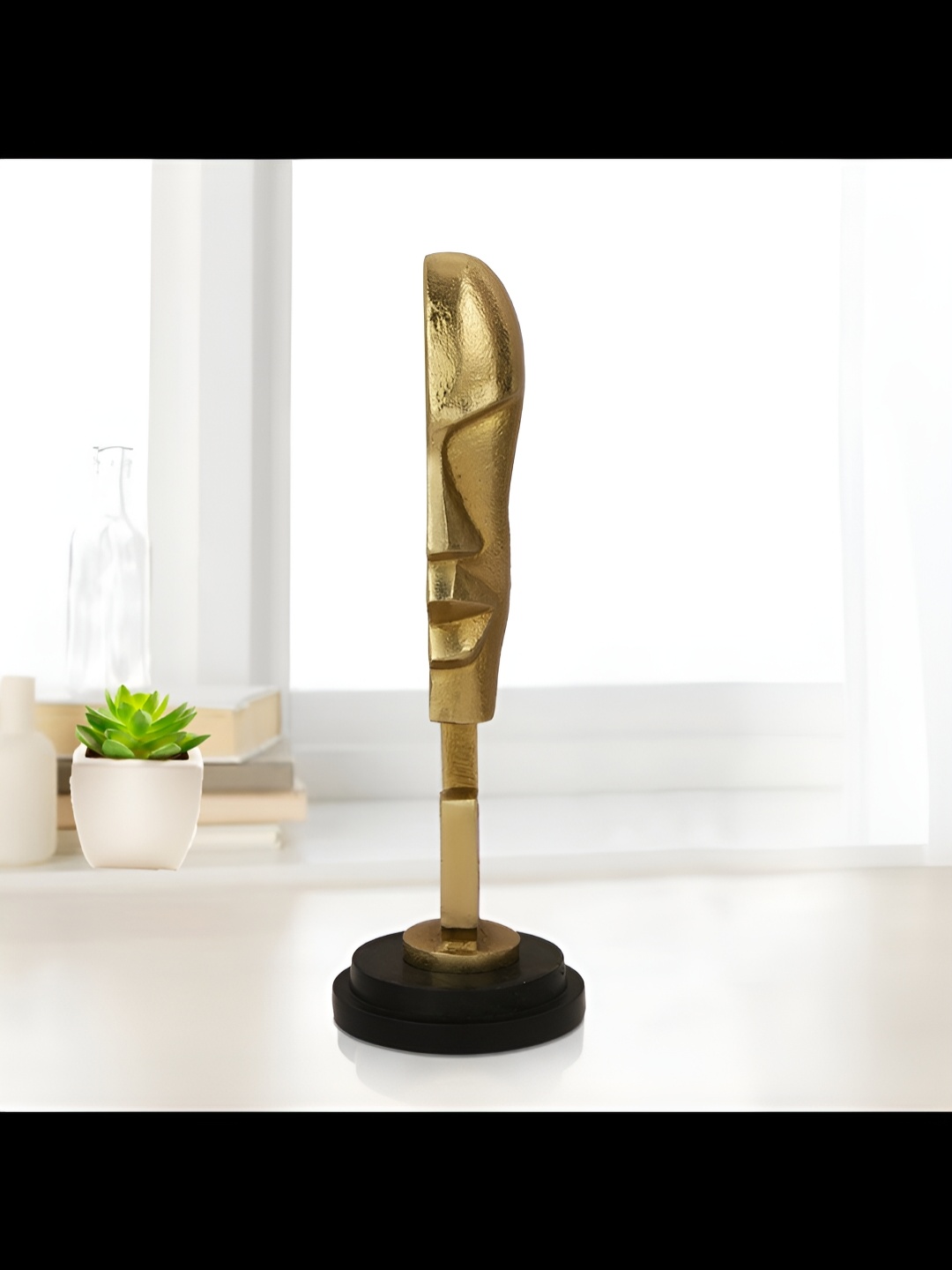 

Cocovey Homes Gold-Toned Half Face Figurine Brass Showpieces