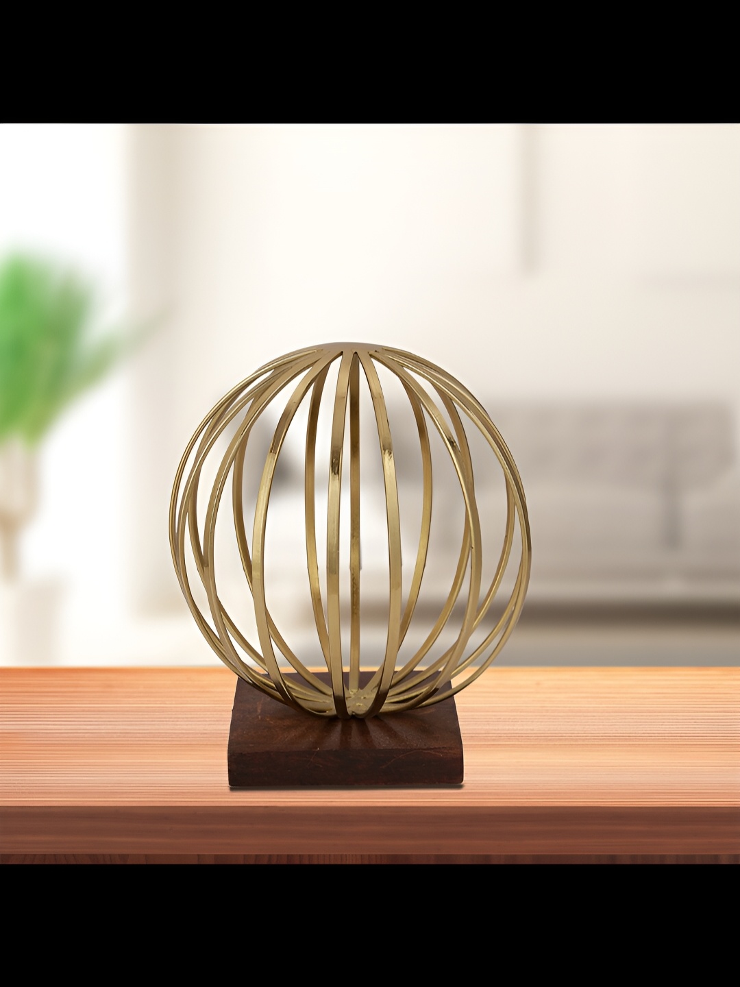 

Cocovey Homes Gold Toned & Brown Steel Showpiece