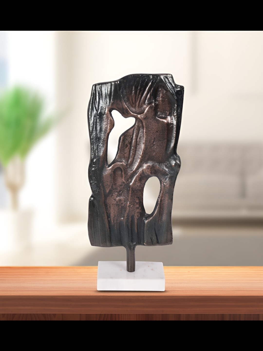 

Cocovey Homes Black & Gold Toned Aluminium Showpiece