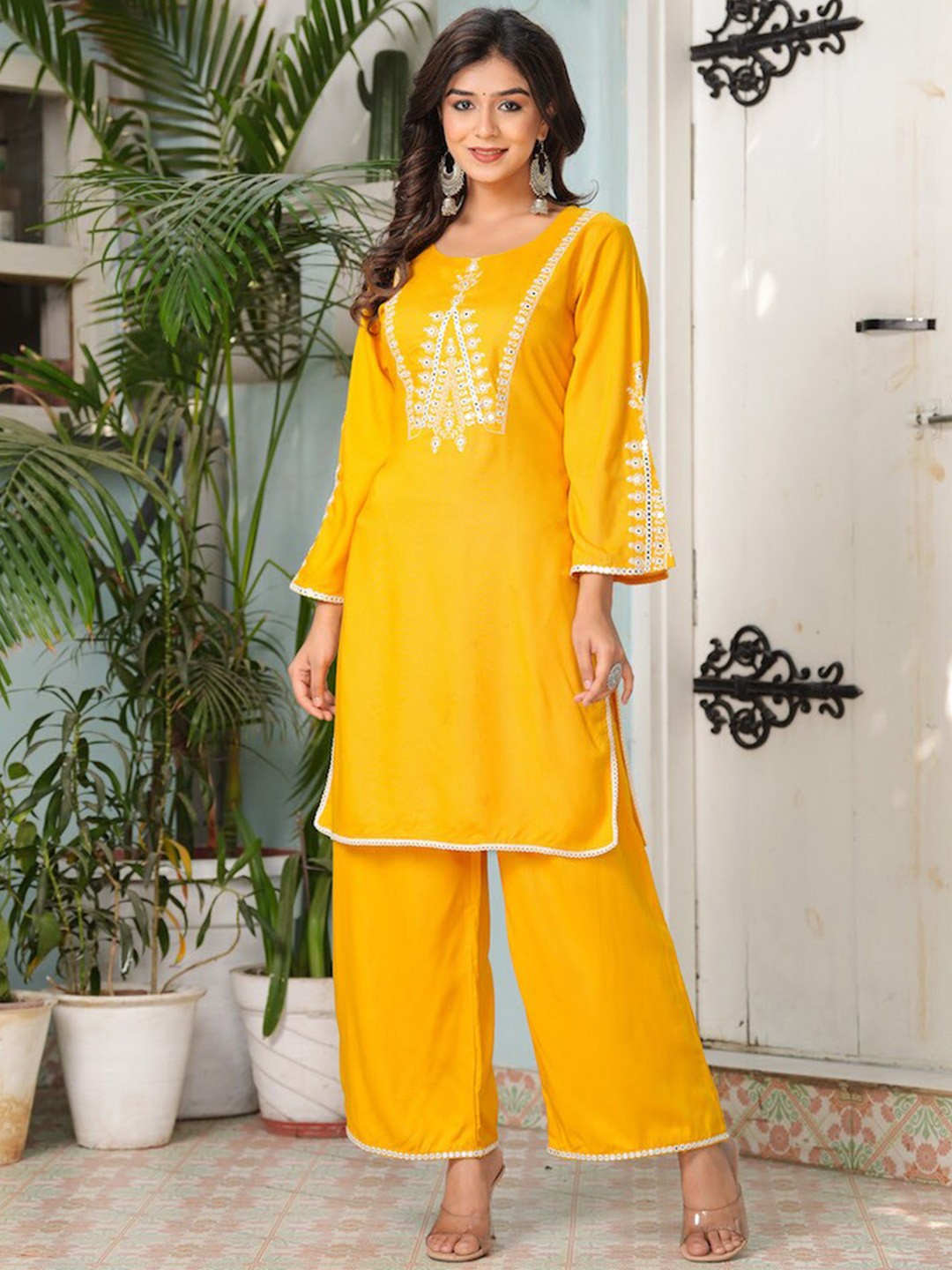 

Hatheli Ethnic Motifs Yoke Design Mirror Work Kurta with Palazzos, Yellow