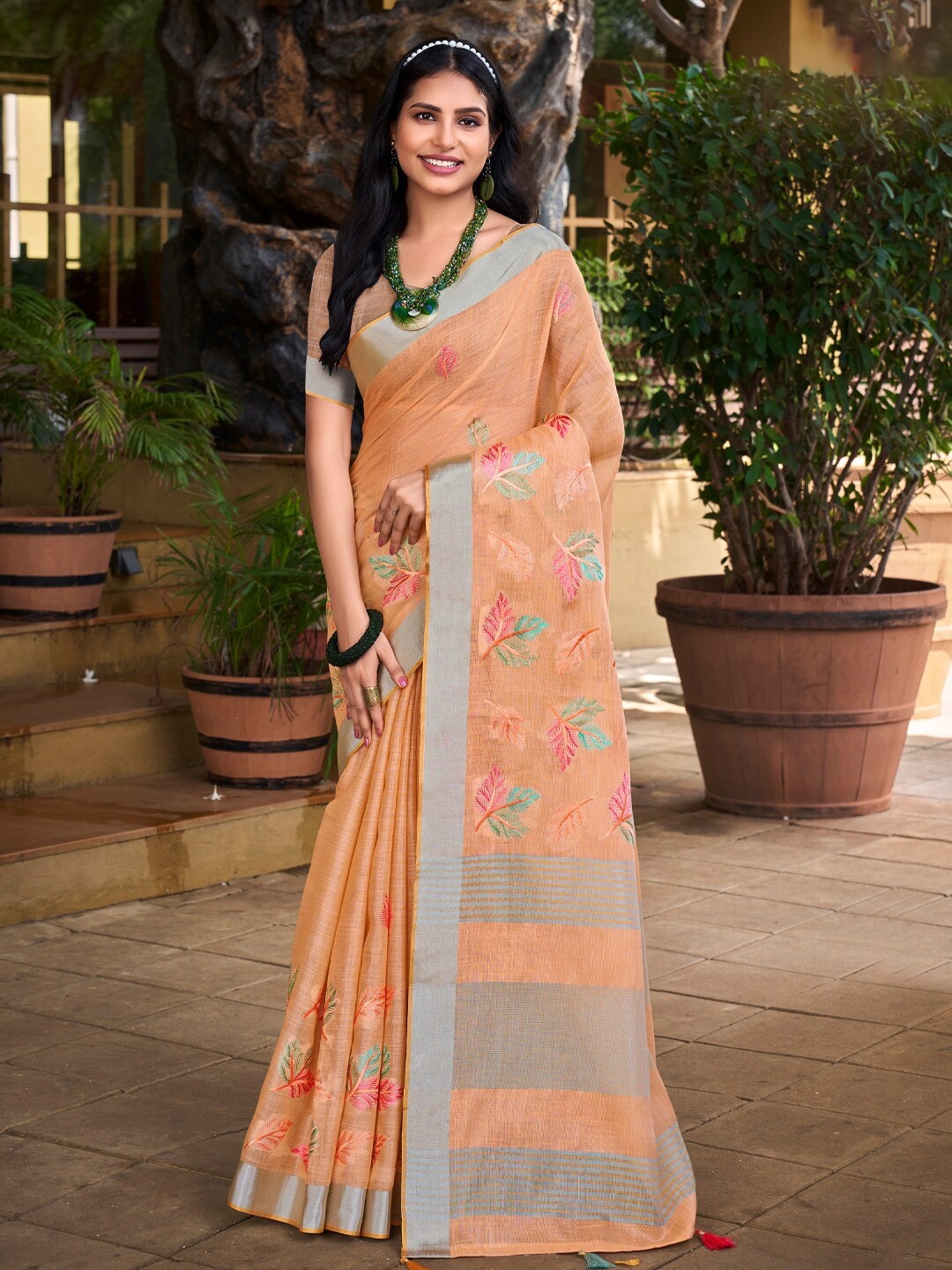 

Mitera Orange Embellished Linen Blend Embroidered Designer Saree