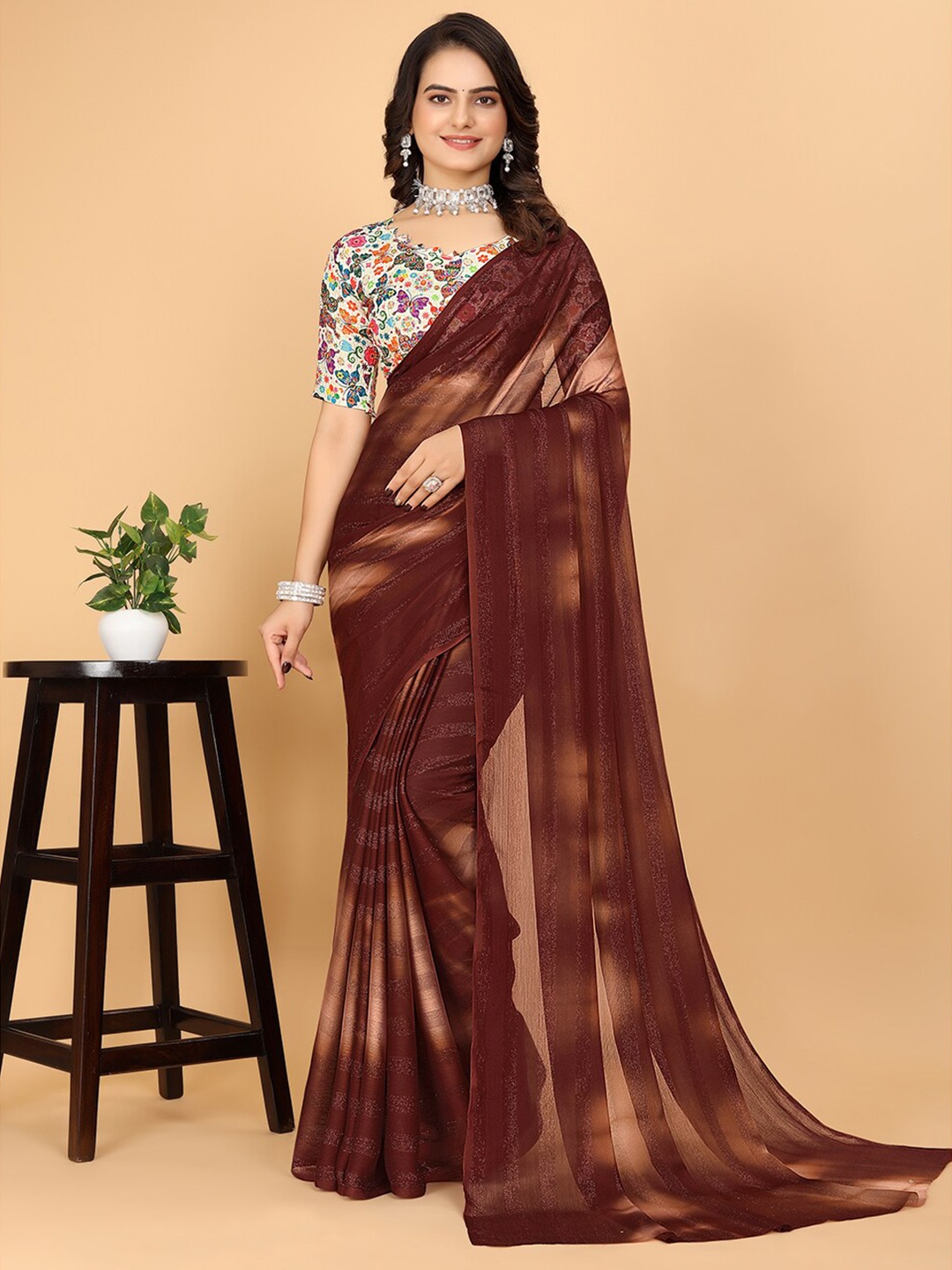 

Pionex Striped Printed Woven Design Poly Chiffon Saree, Brown