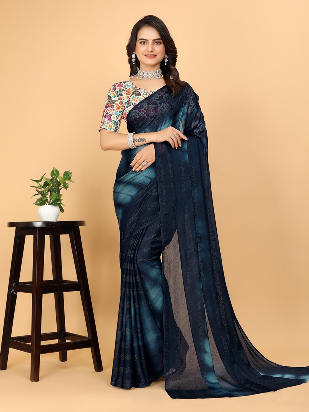 

Pionex Striped Printed Woven Design Poly Chiffon Saree, Navy blue