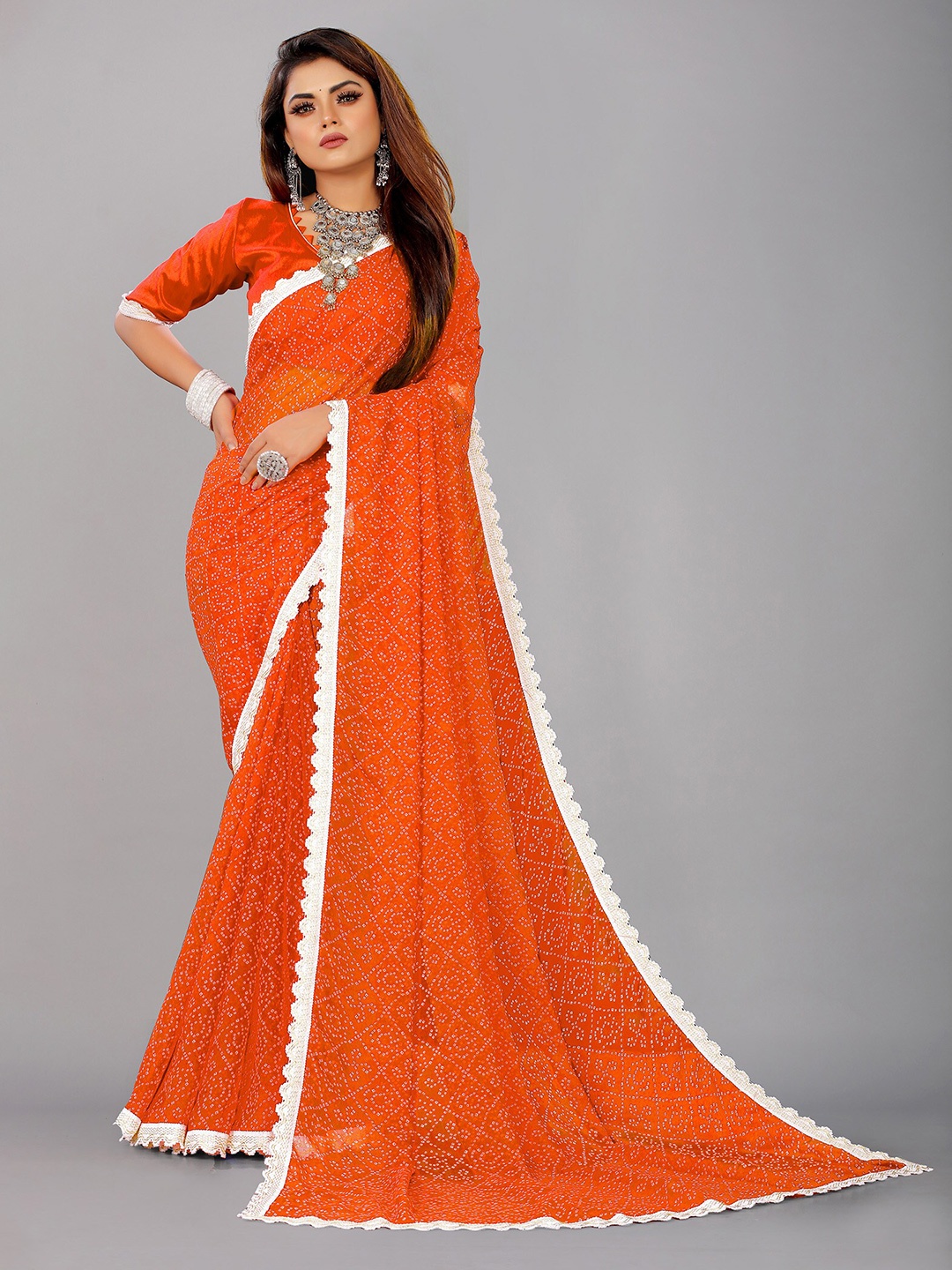 

Reeta Fashion Batik Printed Pure Georgette Saree, Orange