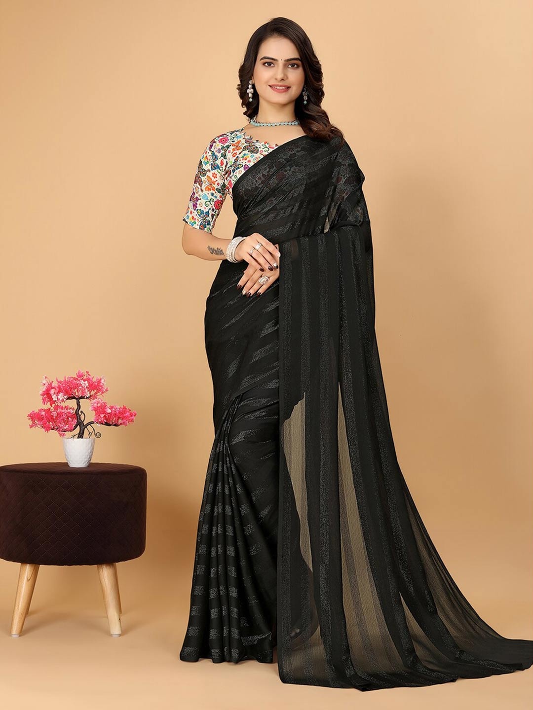 

Pionex Striped Printed Woven Design Poly Chiffon Saree, Black