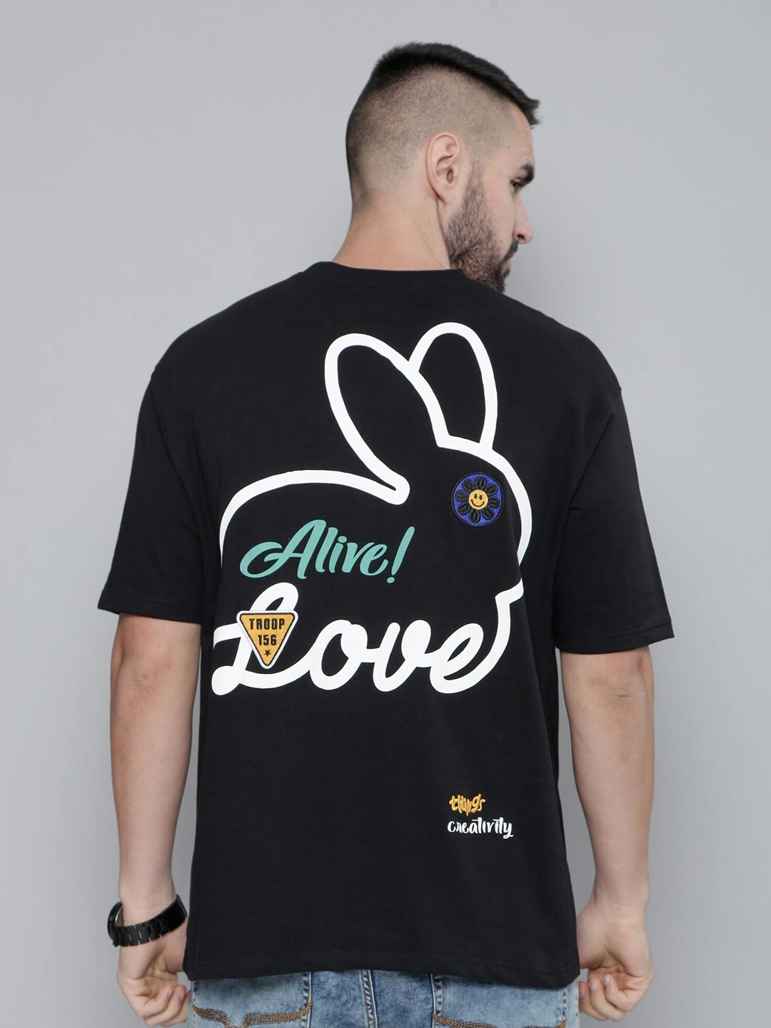 

Maniac Typography Printed Oversized Drop Shoulder Sleeves Cotton T-shirt, Black