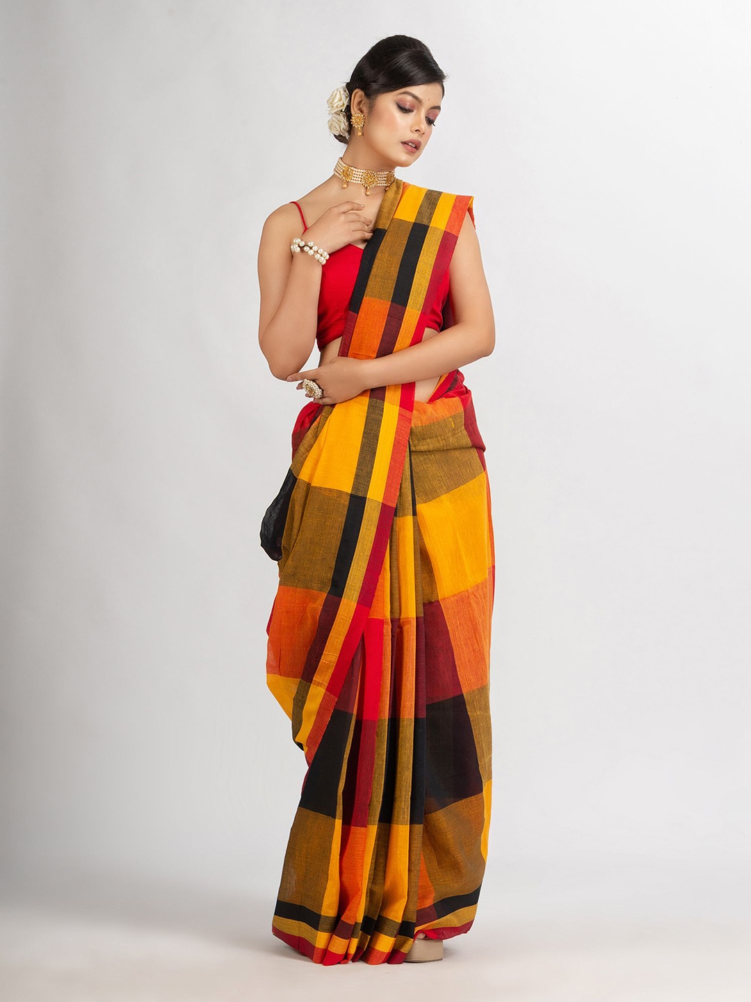 

Angoshobha Checked Pure Cotton Saree, Orange