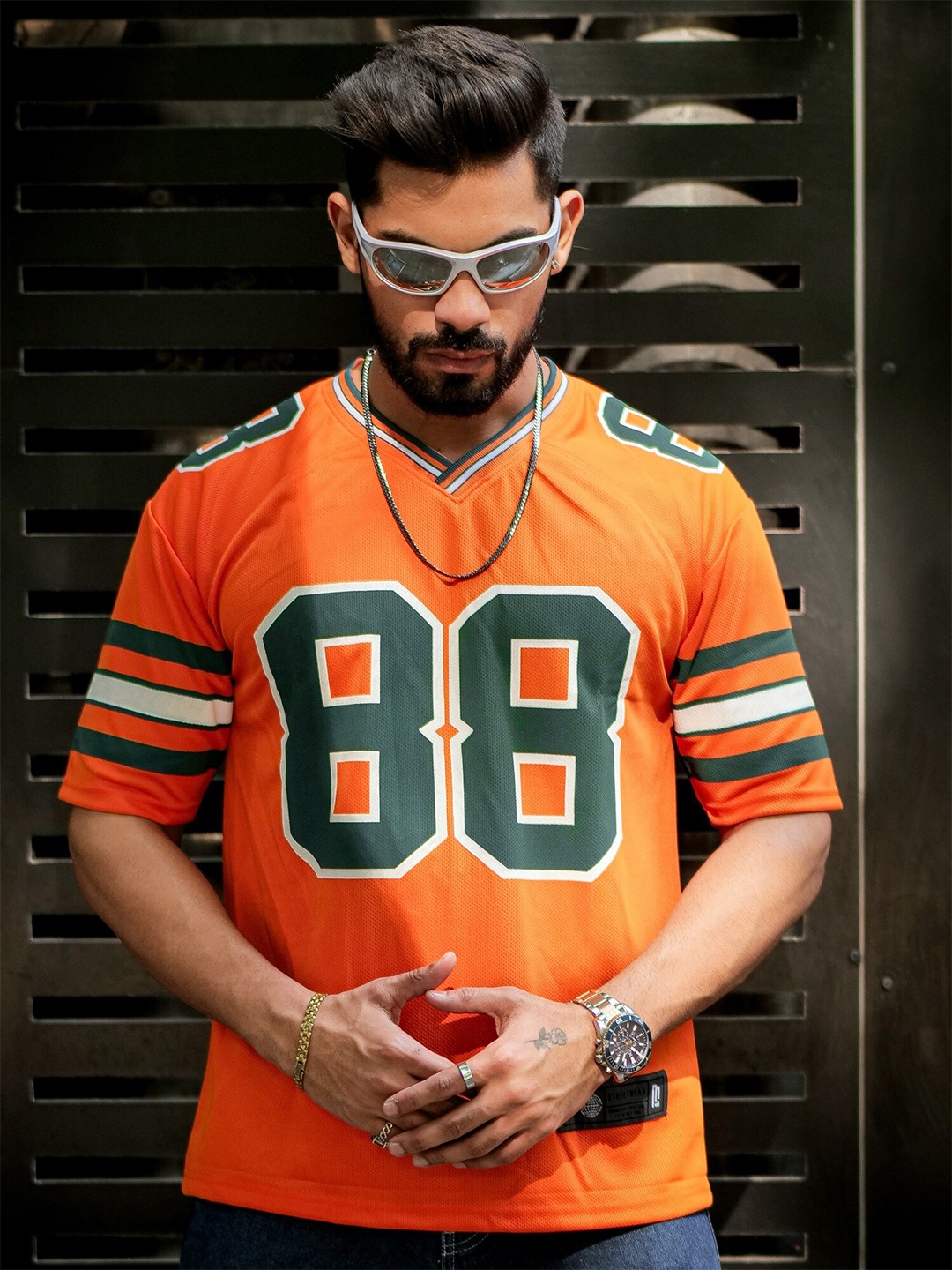 

Maniac Varsity Printed V-Neck Raglan Sleeves Oversized T-shirt, Orange