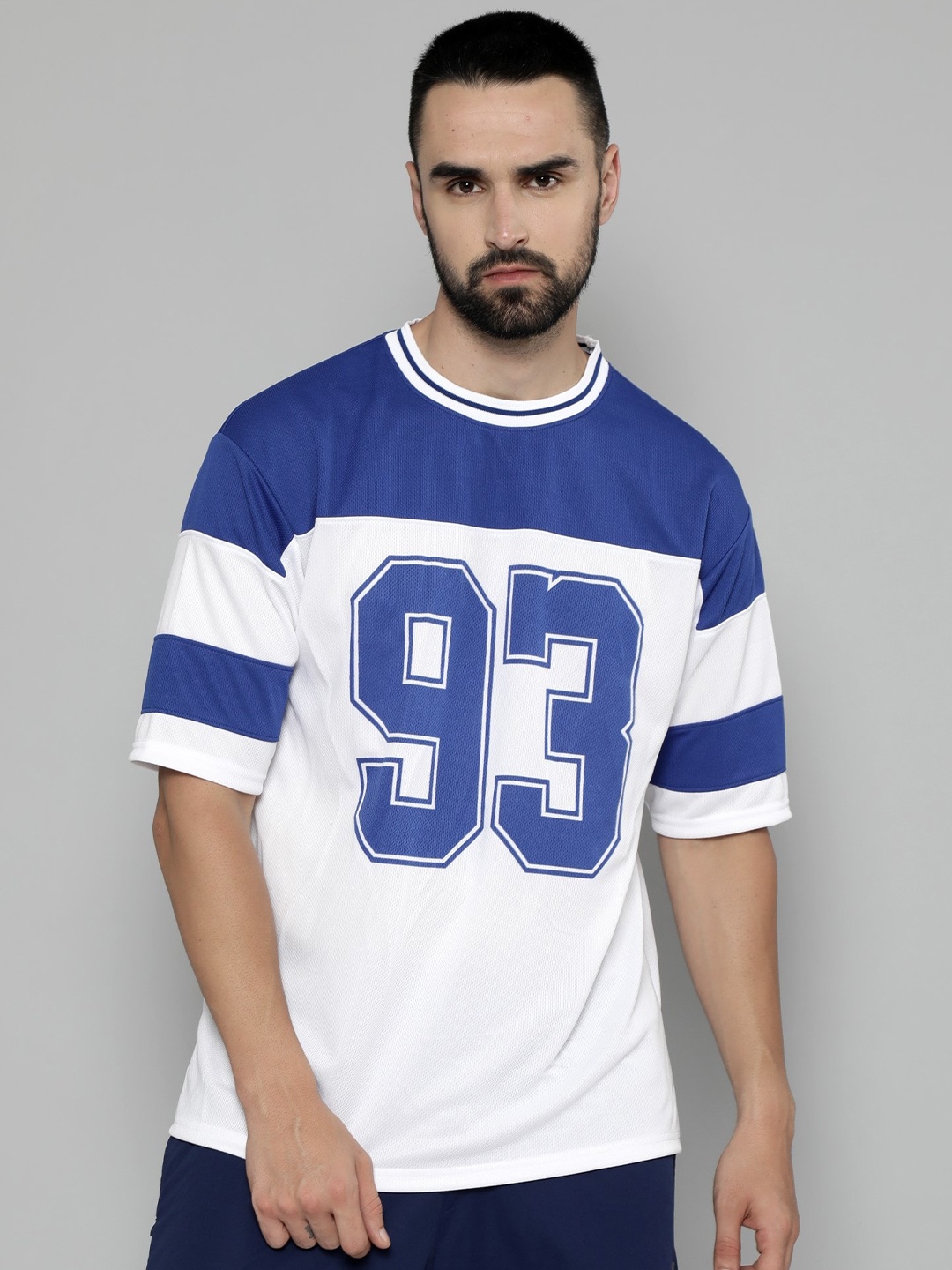 

Maniac Varsity Printed Drop Shoulder Sleeves Slim Fit Oversized T-shirt, Blue