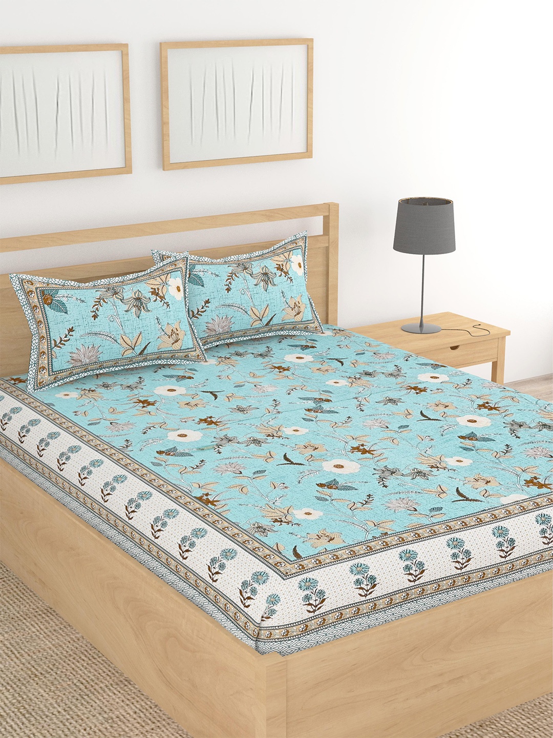 

Lali Prints Blue Floral Printed 210 TC King Bedsheet With 2 Pillow Covers