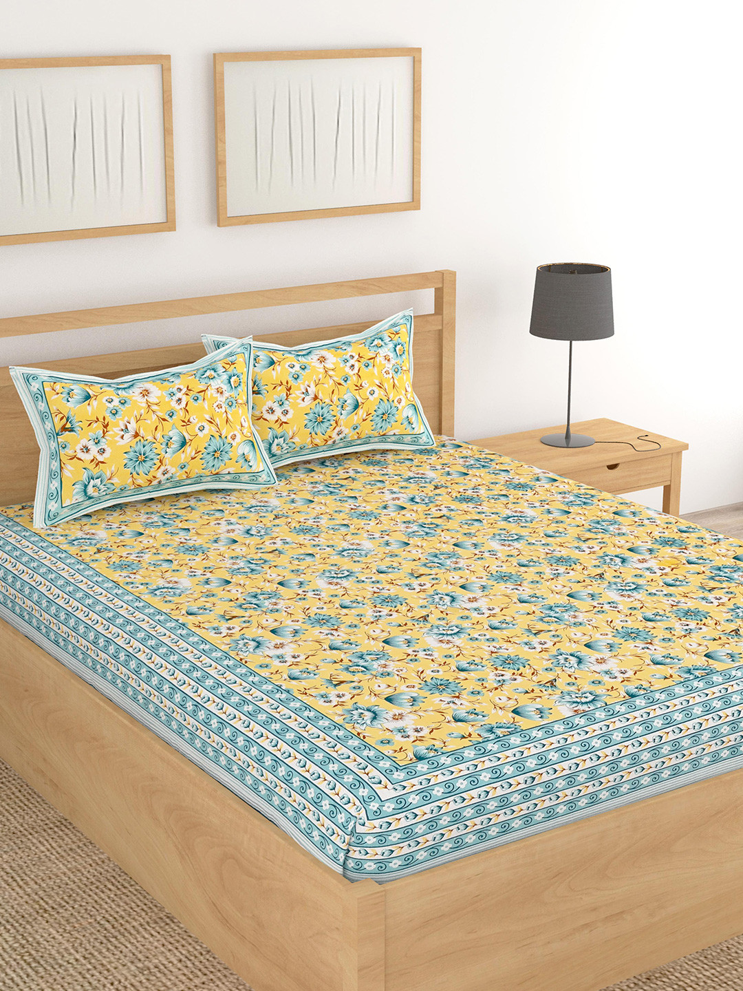 

Lali Prints Yellow & Blue Floral Cotton 210 TC King Bedsheet with 2 Pillow Covers