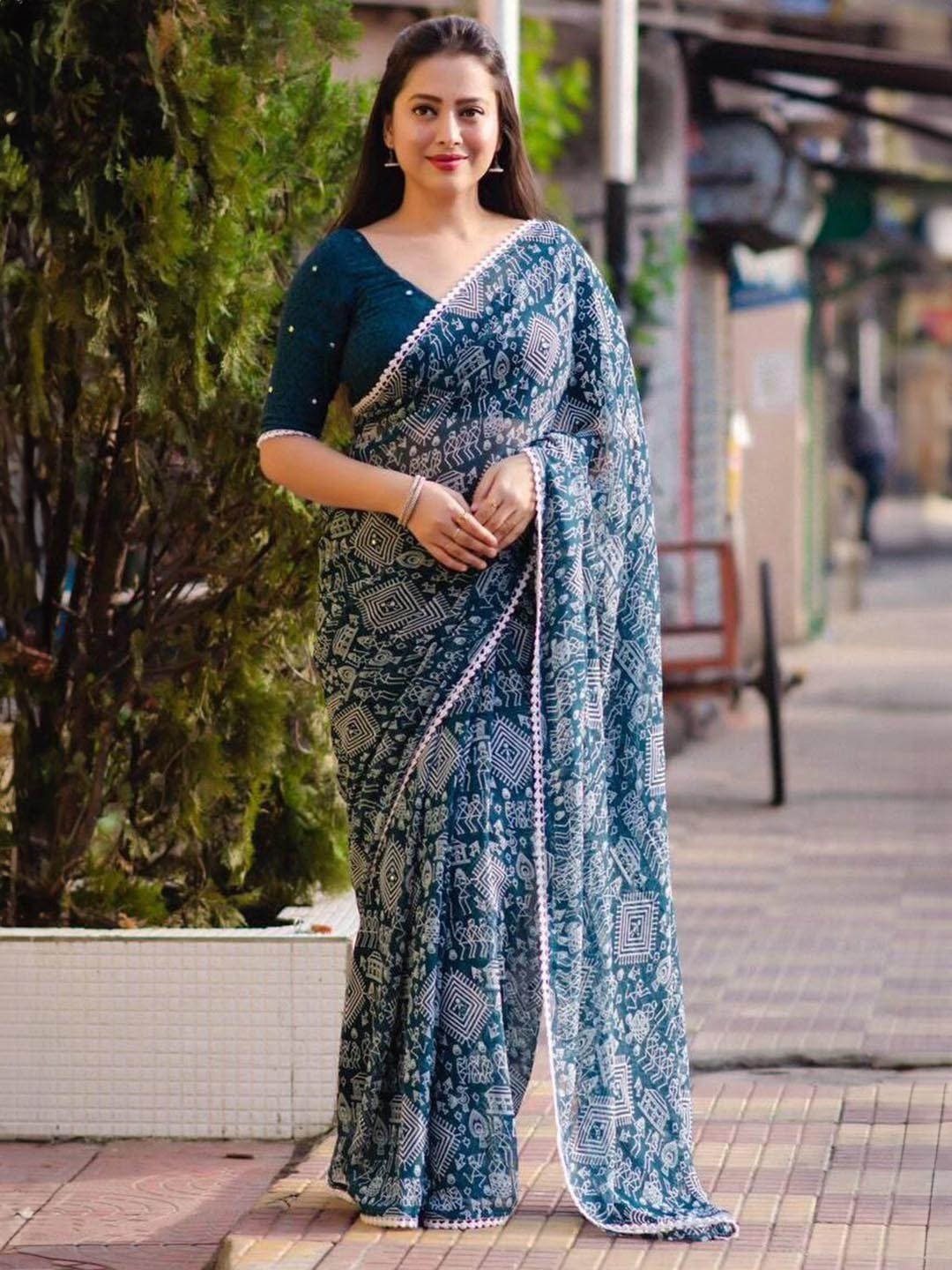 

RadadiyaTRD Ethnic Motifs Printed Mirror Work Pure Georgette Saree, Turquoise blue