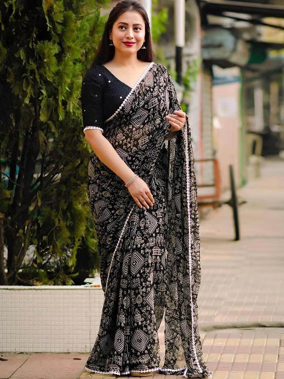 

RadadiyaTRD Ethnic Motifs Printed Mirror Work Pure Georgette Saree, Black