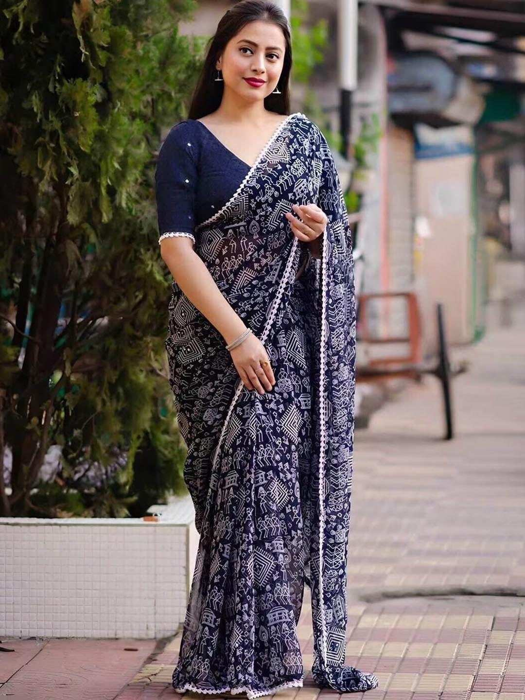 

RadadiyaTRD Ethnic Motifs Printed Mirror Work Pure Georgette Saree, Navy blue