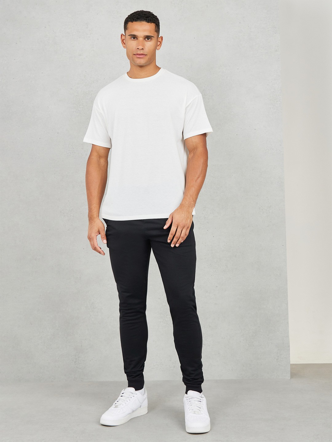 

Styli Men Eco-Earth Slim Fit Cotton Terry Joggers, Black