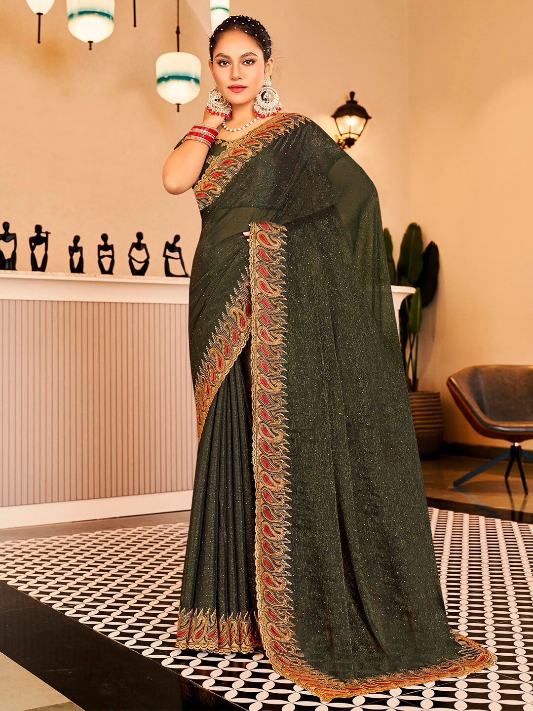 

Kalista Green Embellished Beads & Stones Pure Chiffon Saree