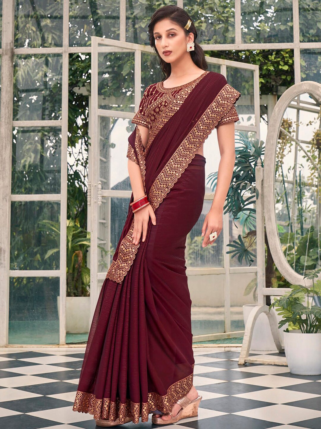 

Kalista Brown Embellished Embroidered Pure Chiffon Saree