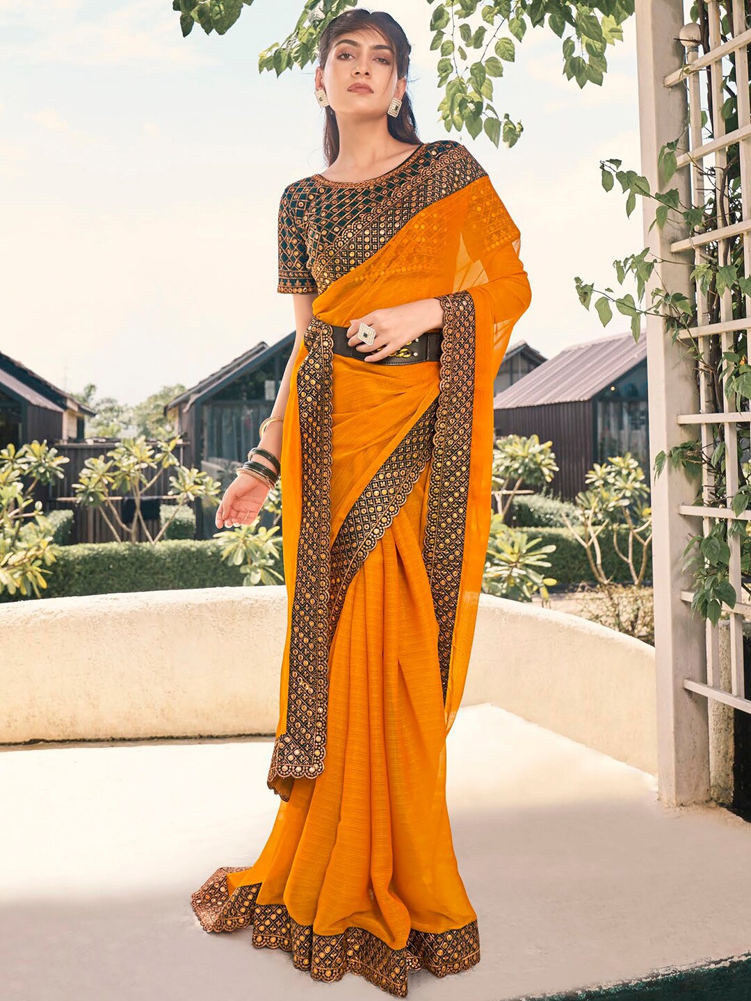 

Kalista Mustard Embellished Embroidered Pure Chiffon Saree