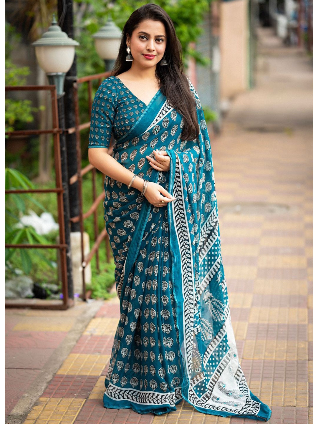 

STAVA CREATION Ajrak Block Poly Georgette Designer Saree, Teal