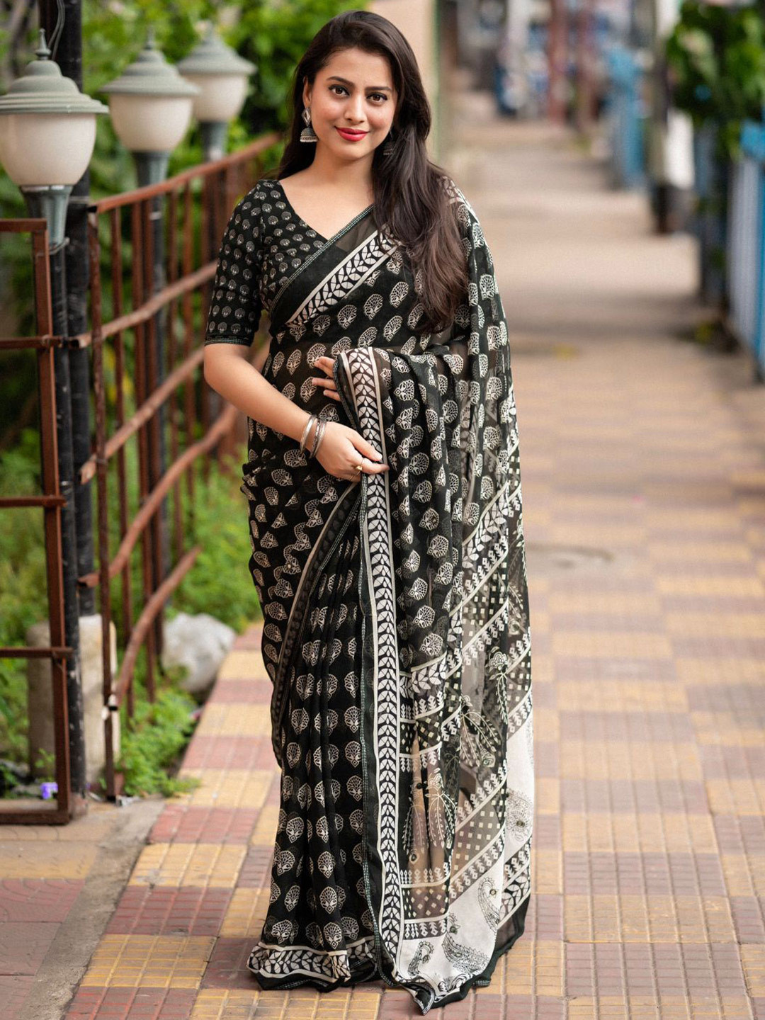 

STAVA CREATION Ajrak Block Poly Georgette Designer Saree, Black