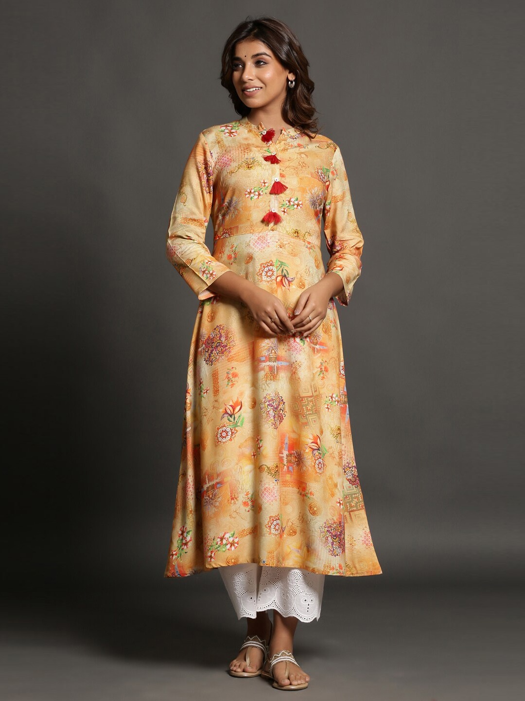 

MAIYEE Floral Printed Mandarin Collar A-Line Kurta with Tassel, Yellow