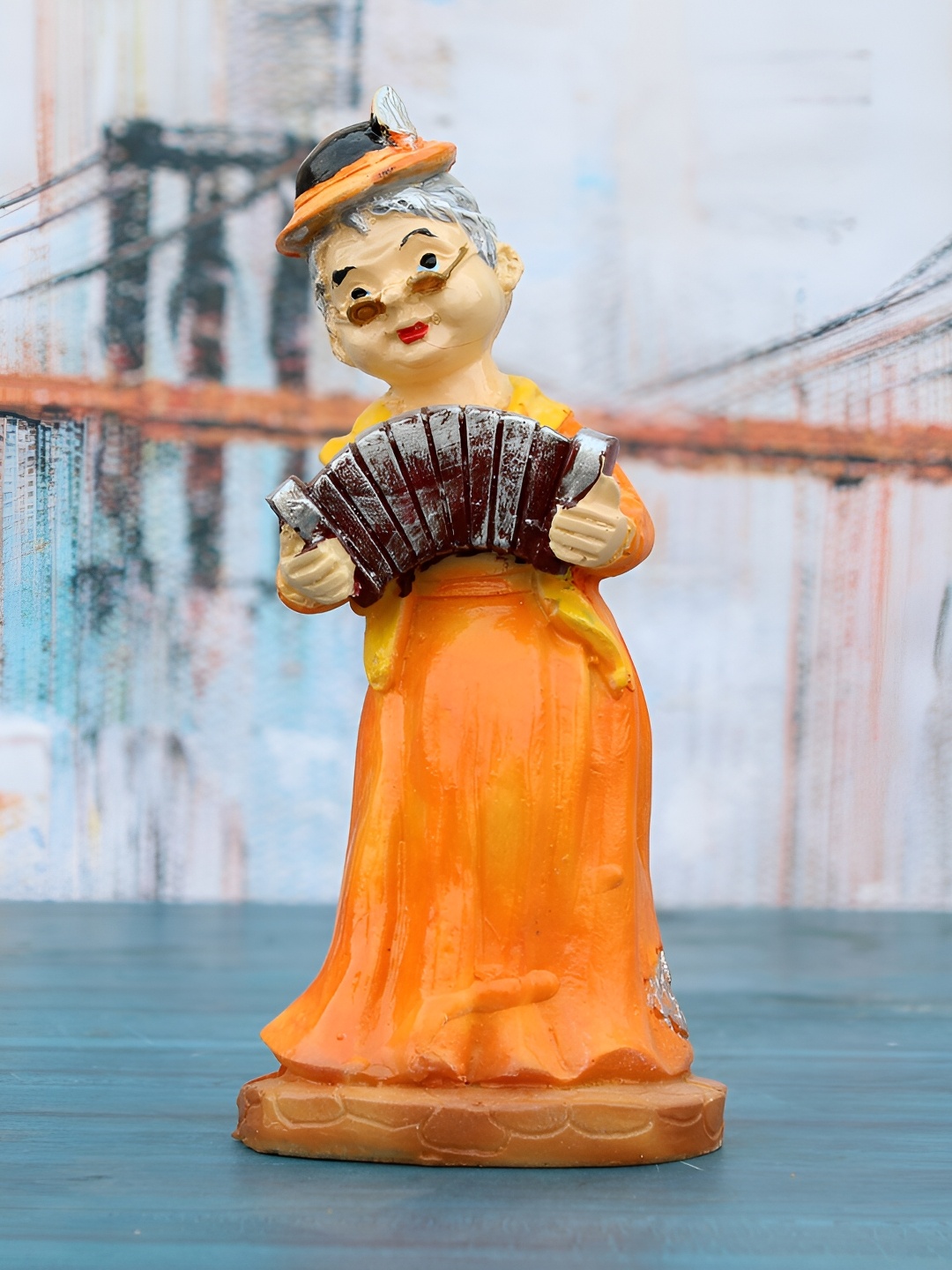 

Vikarafty Orange Fengshui Figurine Showpiece