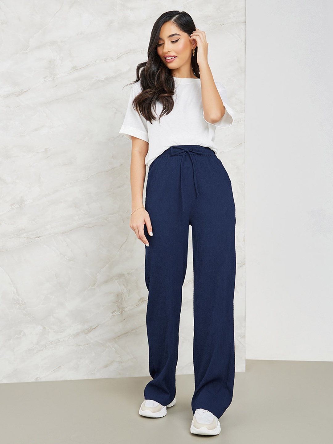 

Styli Women Flared High-Rise Trousers With Side Pocket, Navy blue