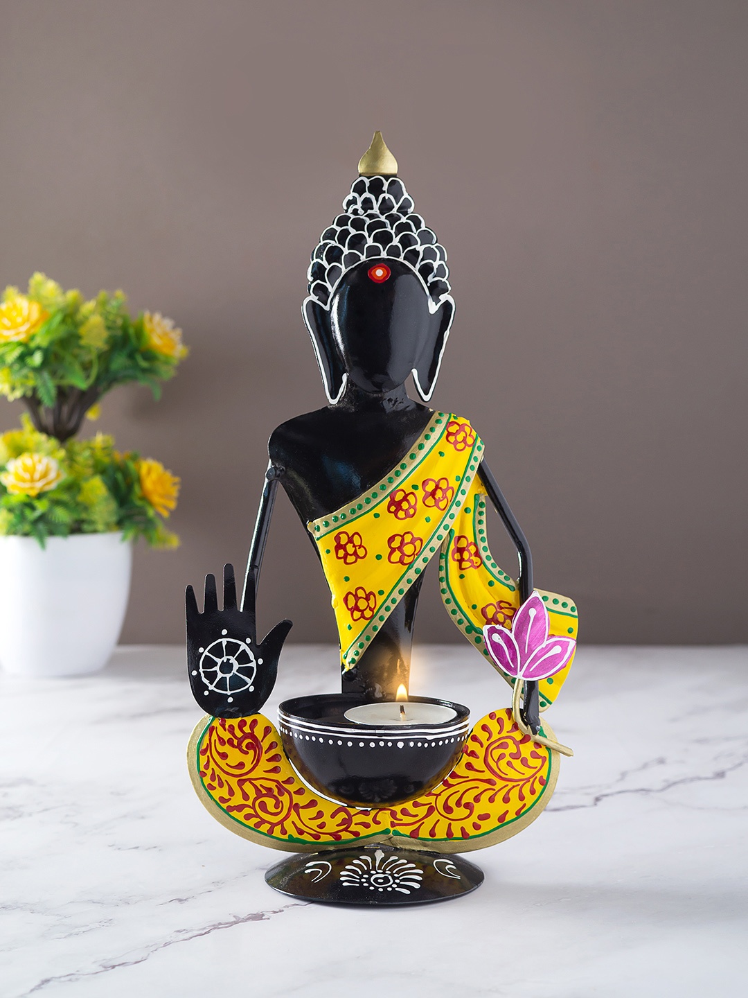 

Golden Peacock Black & Yellow Printed Buddha Shaped Candle Holder