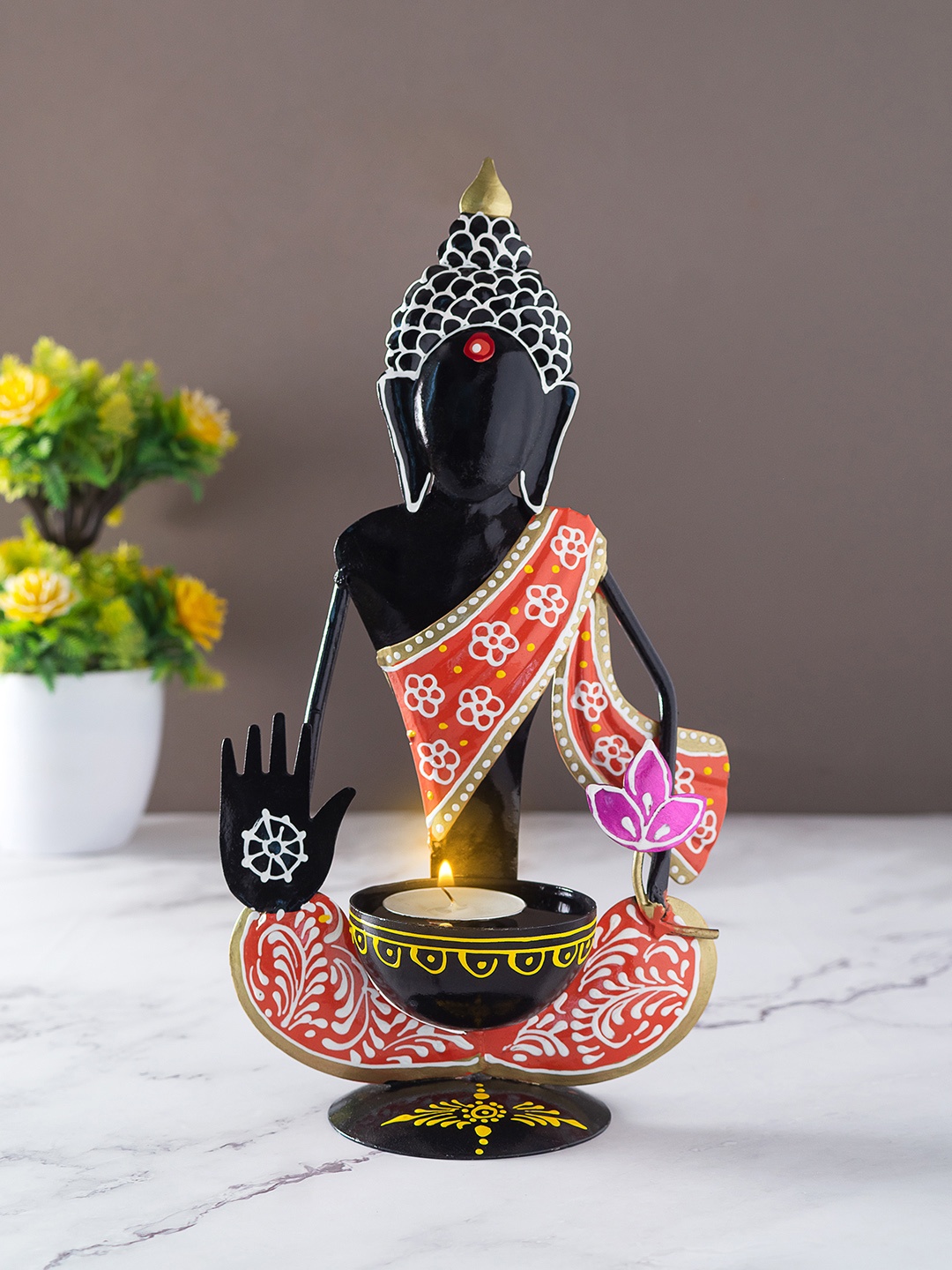 

Golden Peacock Orange & Black Printed Buddha Shaped Candle Holder