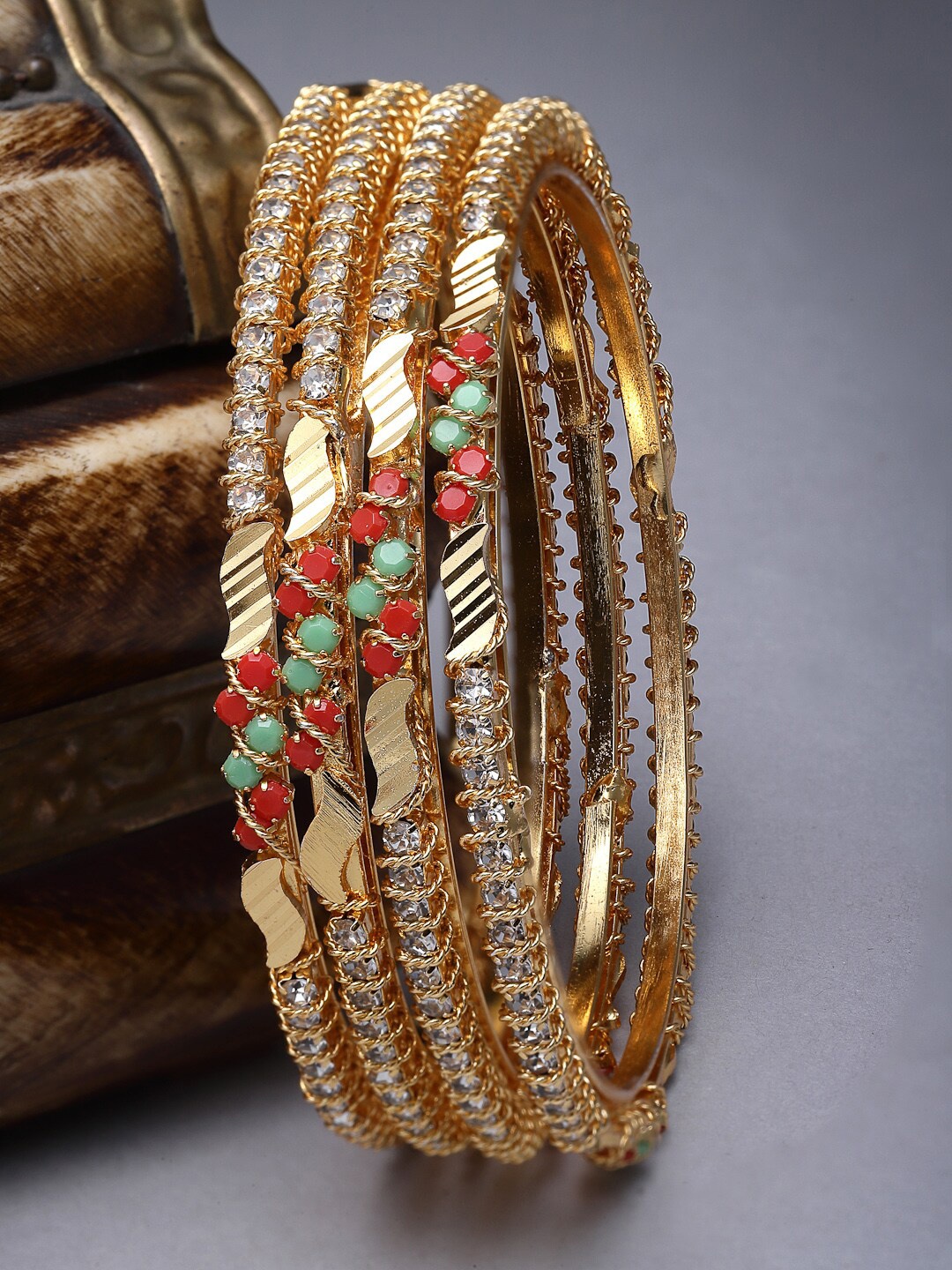 

Sukkhi Set Of 4 Gold-Plated American Diamond-Studded Bangles