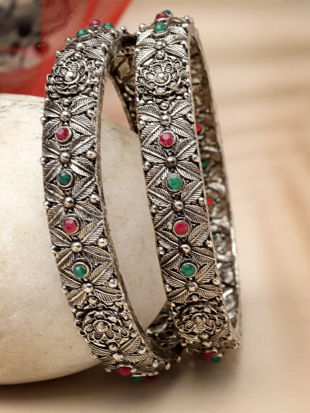 

Sukkhi Set Of 2 Rhodium Plated Floral Design Silver Oxidised Bangles