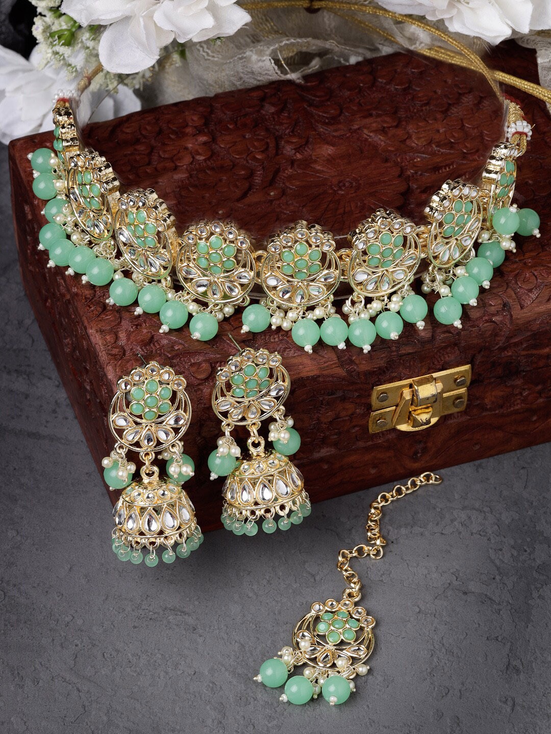 

Sukkhi Gold Plated Kundan Studded & Beaded Necklace and Earrings With Maang Tika