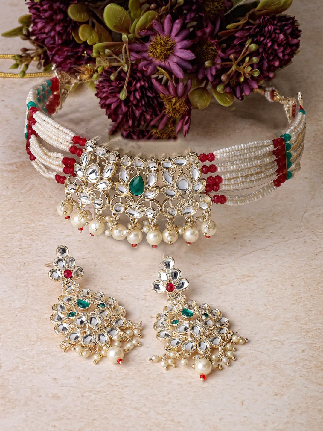 

Sukkhi Gold Plated American Diamond Studded & Beads Beaded Jewellery Set