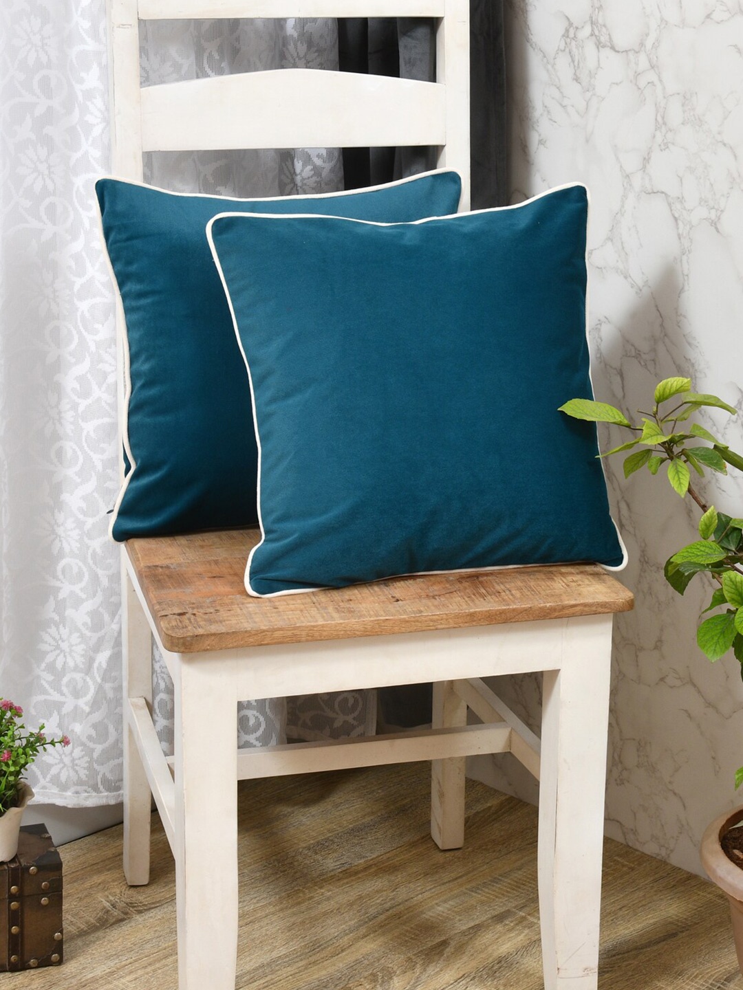 

Clasiko Teal & White 2 Pieces Velvet Square Cushion Covers